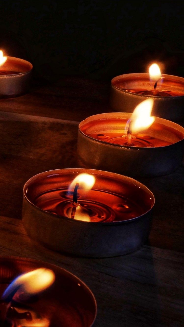 750x1334 Candles Flame Fire On Wood Table Dark Background 4K HD Dark Background Wallpaper