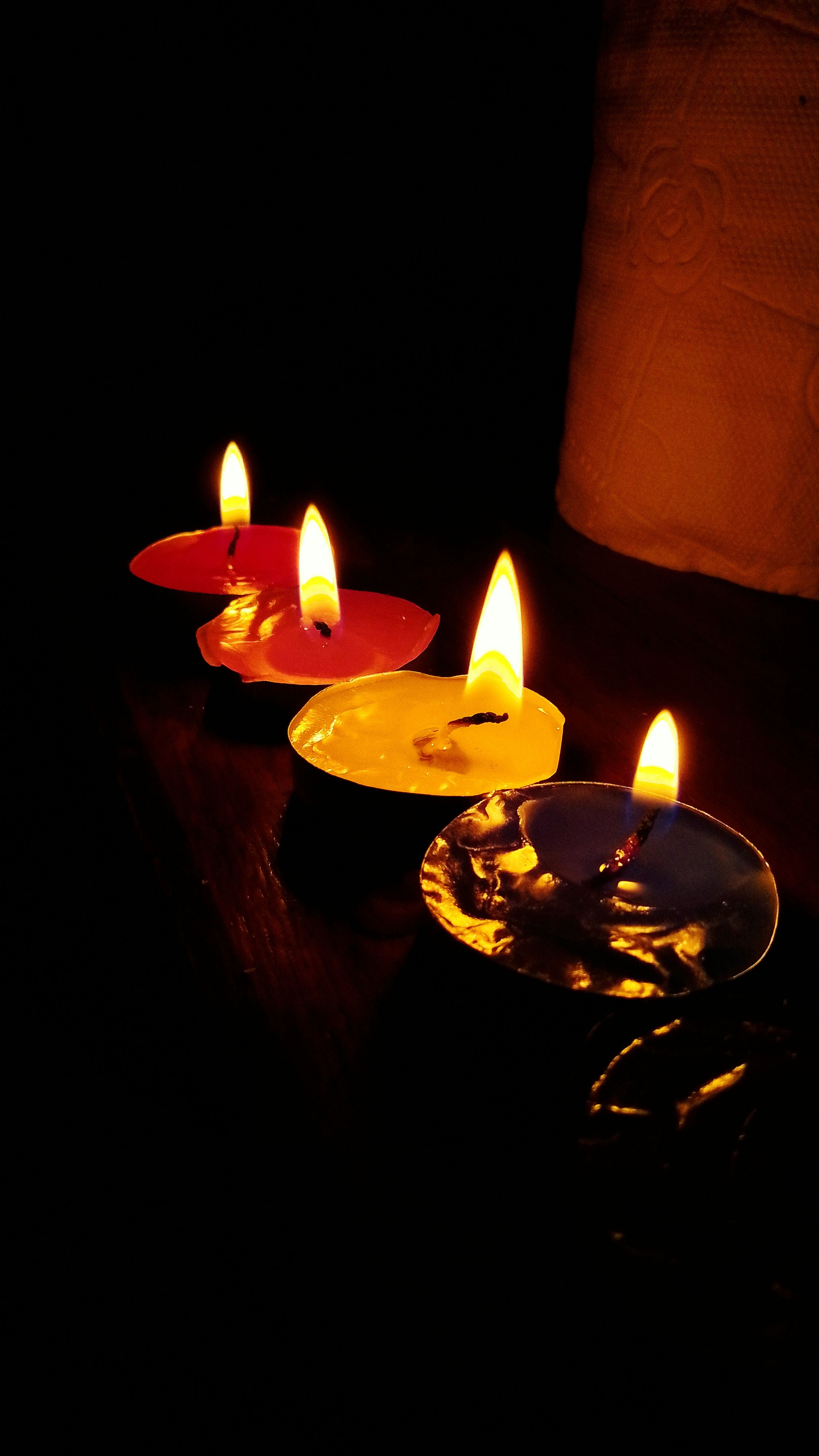 2250x4000 Warm Candlelight with Colorful Floating Candles · Free