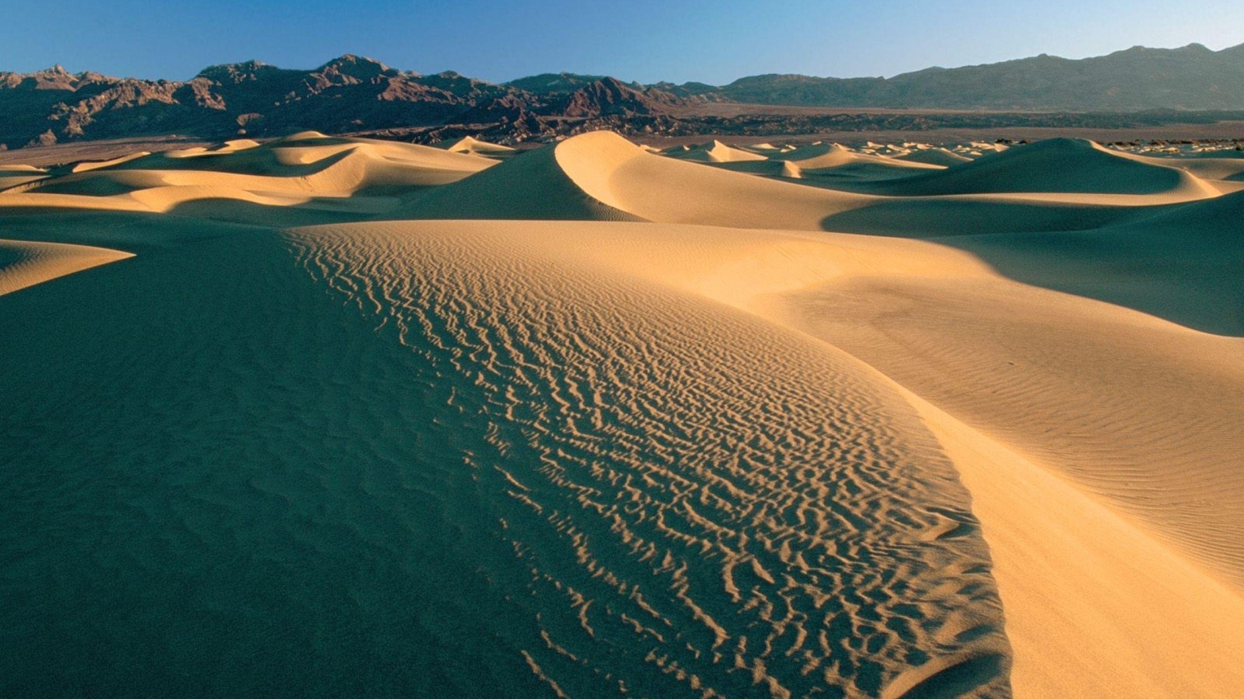 2560x1440 Desert sand dunes mountains clouds sky emptiness Download Free Wallpaper