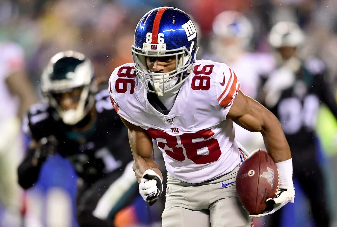 1280x863 Download N F L Player Darius Slayton Running With Football Wallpaper