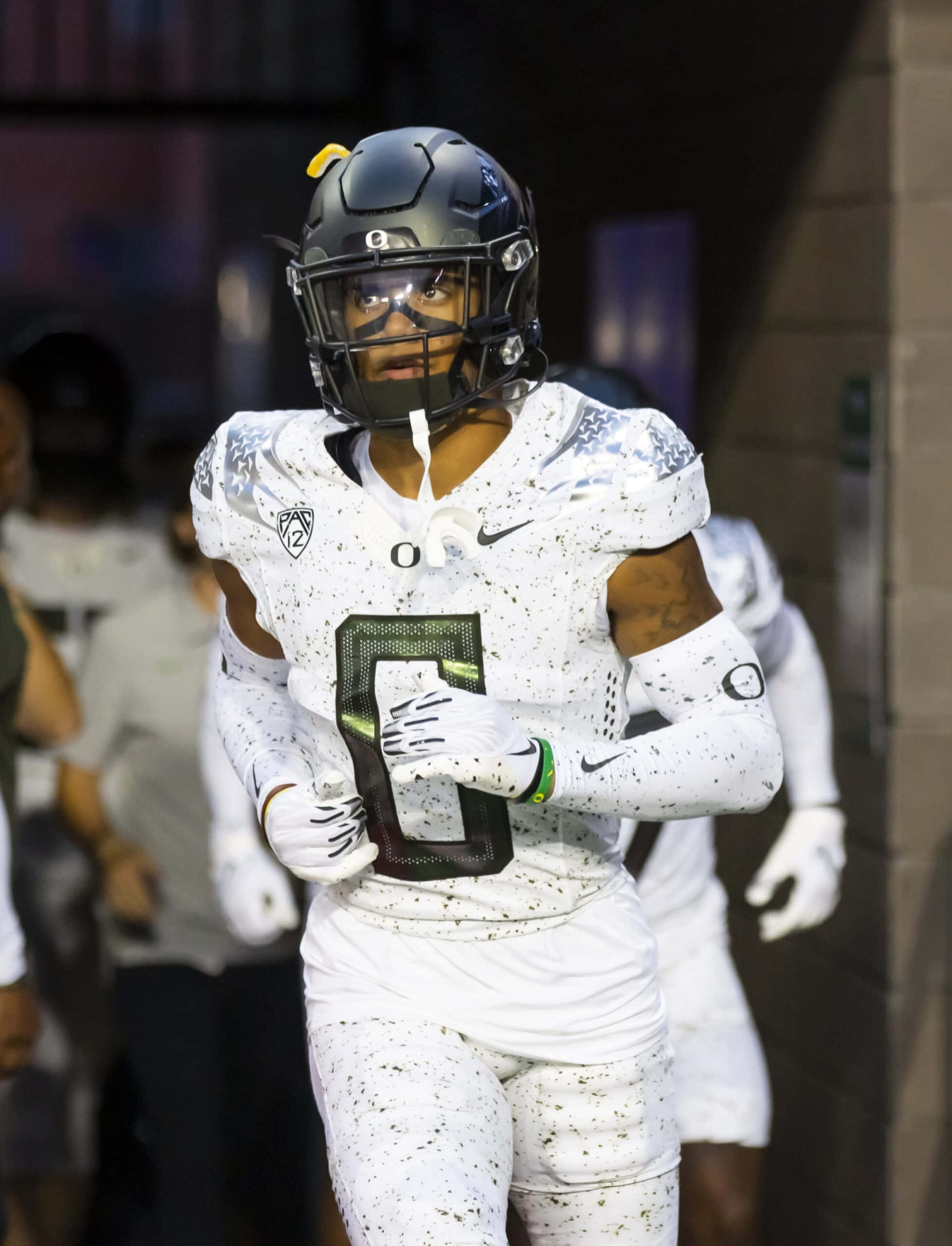 1956x2560 Download Focused Football Player Entering Stadium Wallpaper
