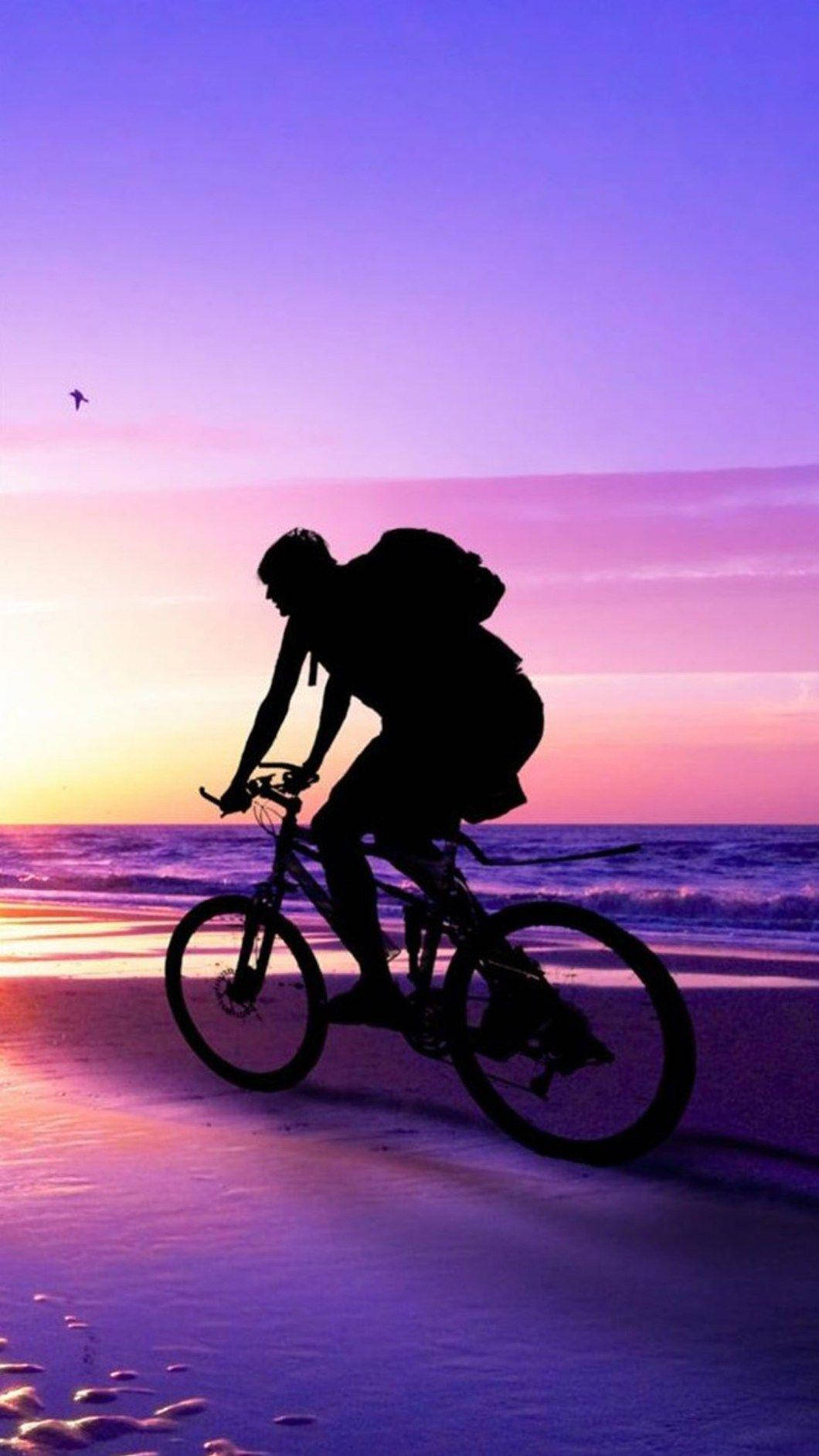 1060x1884 Download Scenic Bike Ride on the Beach Wallpaper