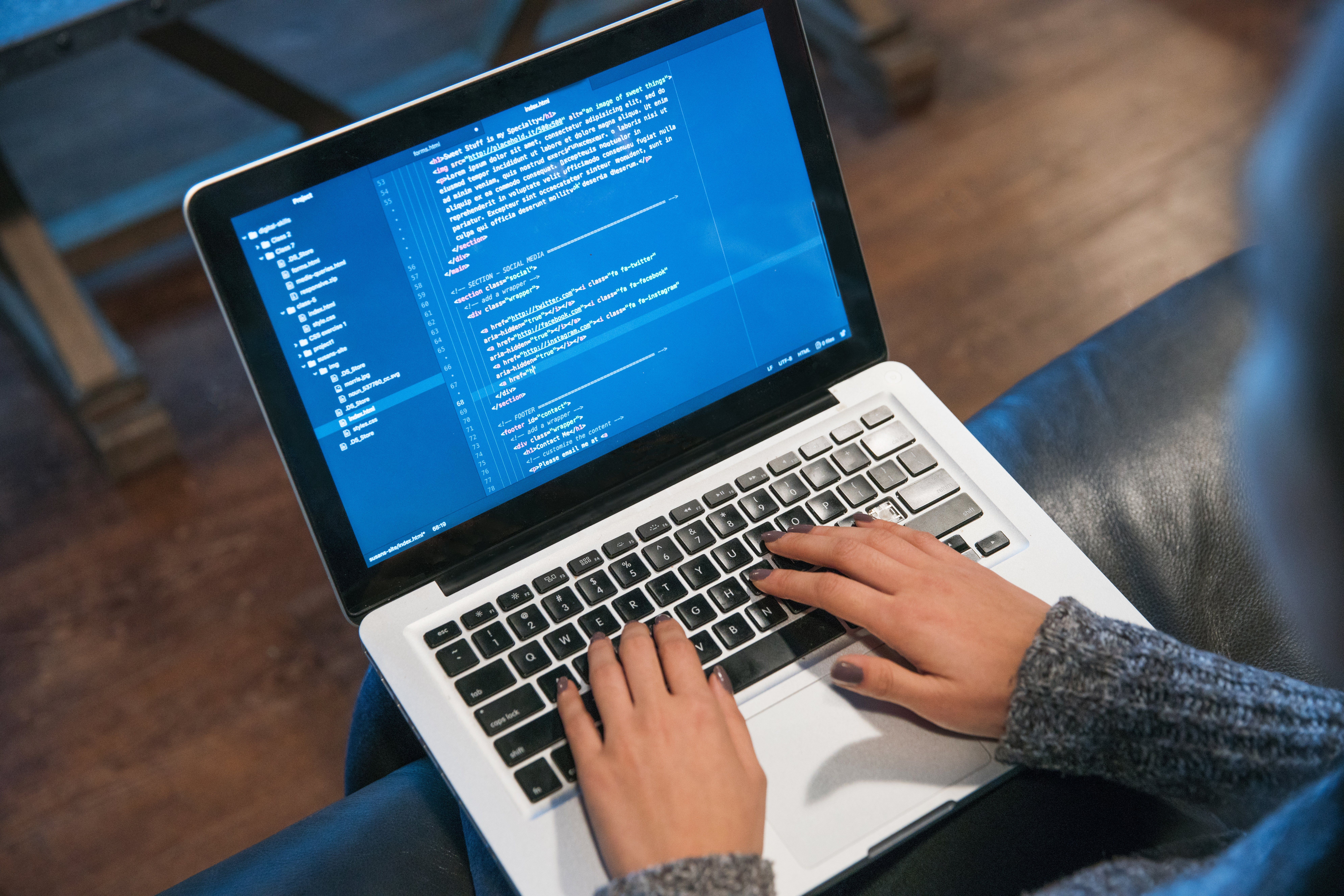 7952x5304 Picture of Hands Typing Code On Laptop