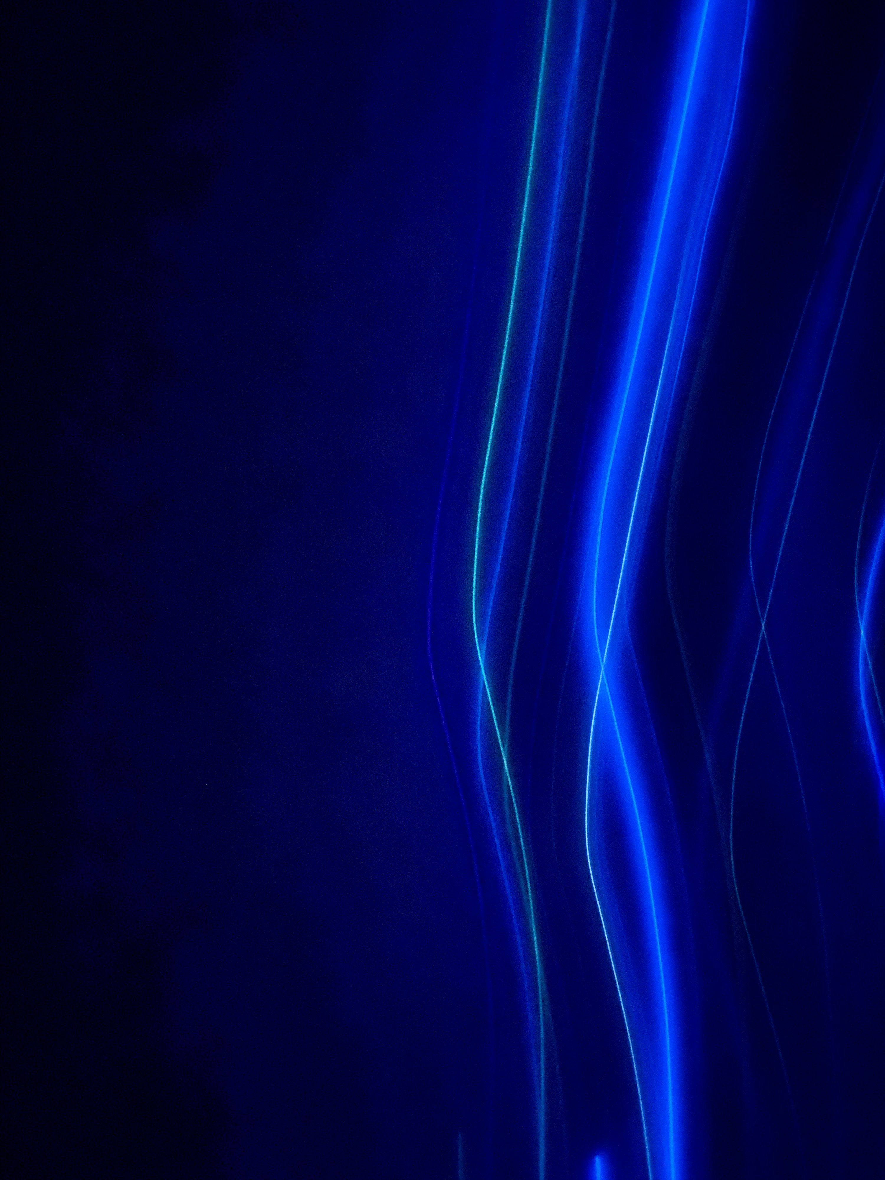 3000x4000 A dark blue background with lines of light