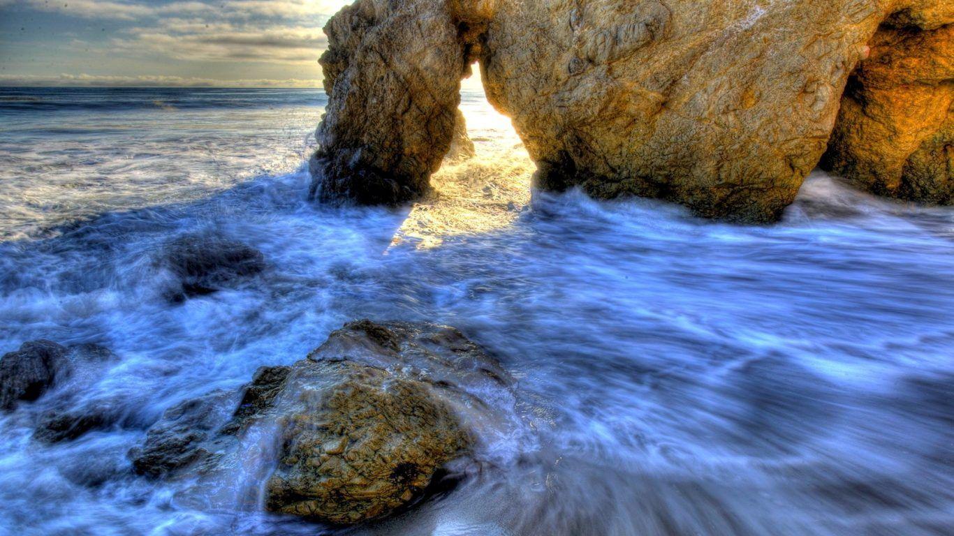 1366x768 Beaches: Nicaragua Sky Ocean Blue Sunset Clouds Coastline Rocks