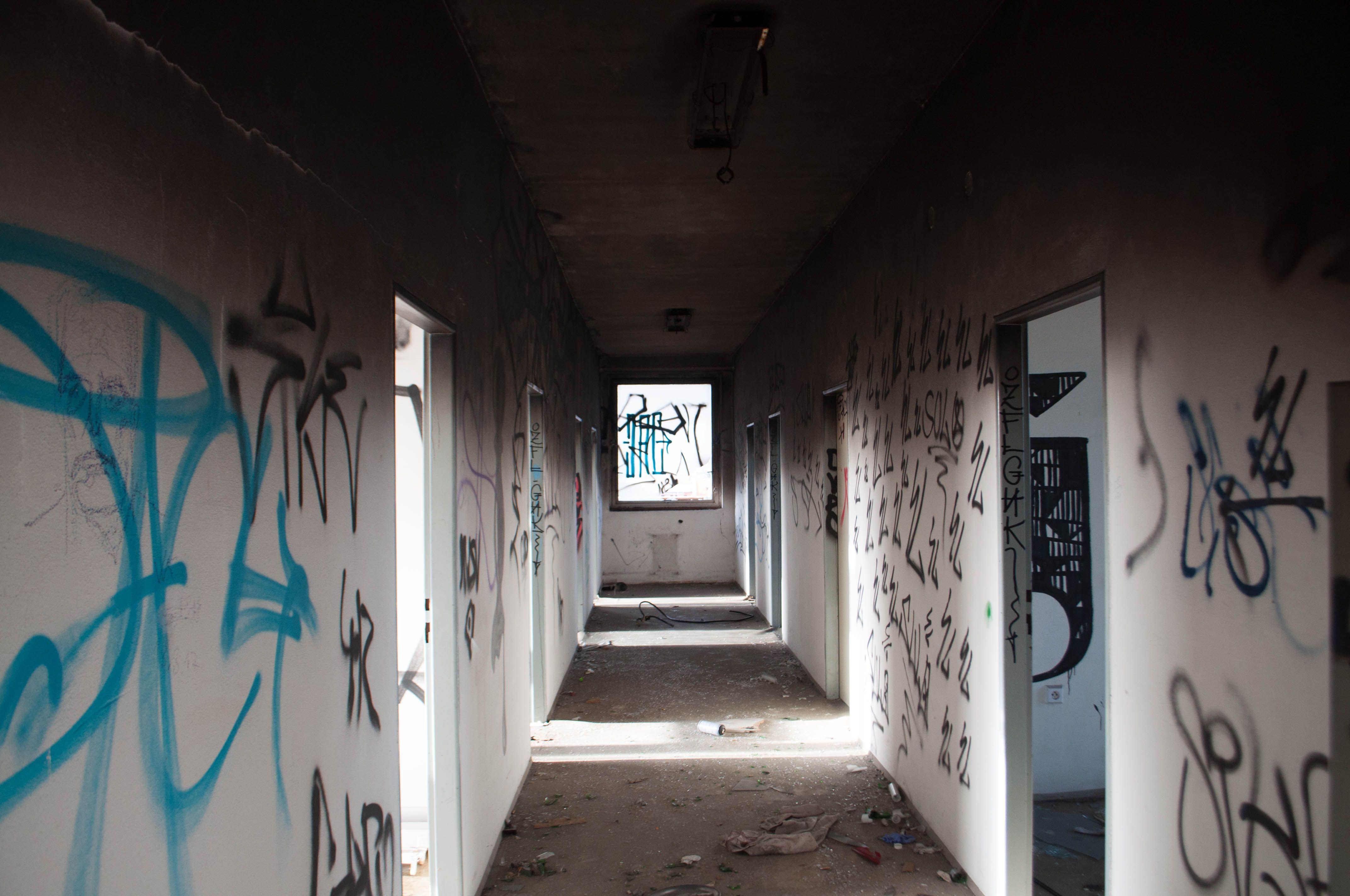 4288x2848 Empty Hallway With Black and Blue Graffiti wallpaper