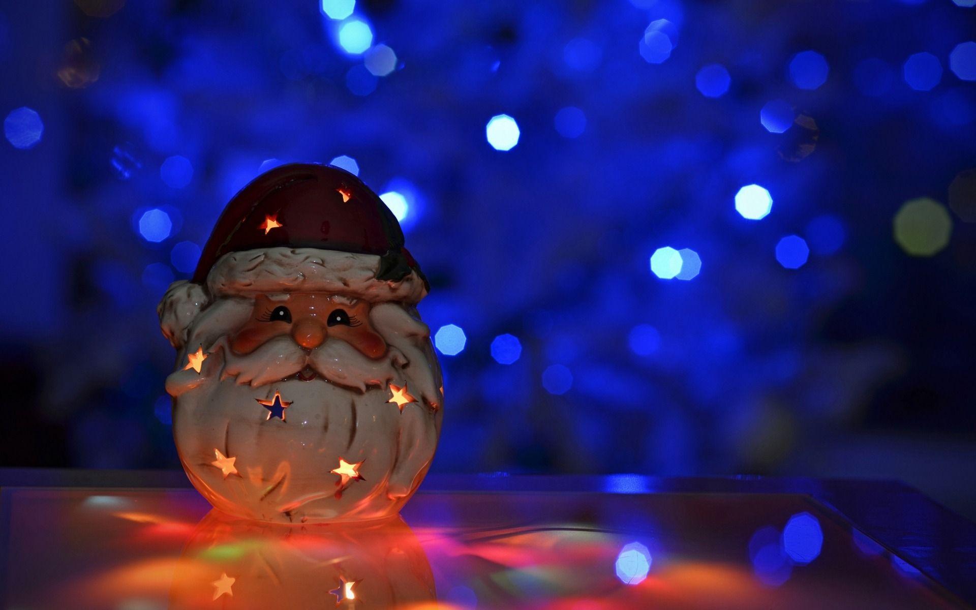 1920x1200 Bokeh Candle Toy Santa Claus Christmas Desktop Wallpaper