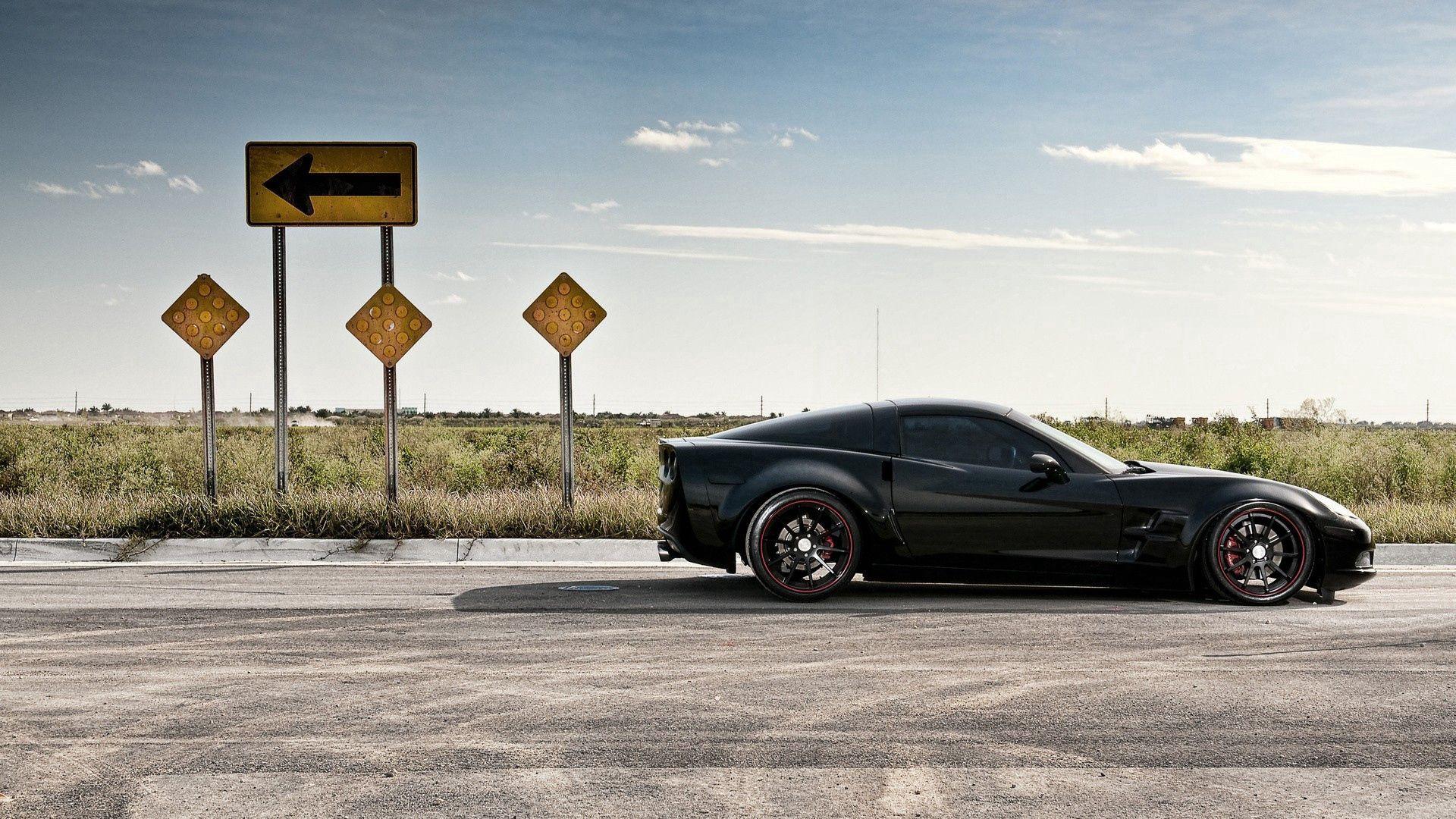 1920x1080 Download wallpaper 1920x1080 road, traffic, auto, black, corvette HD background