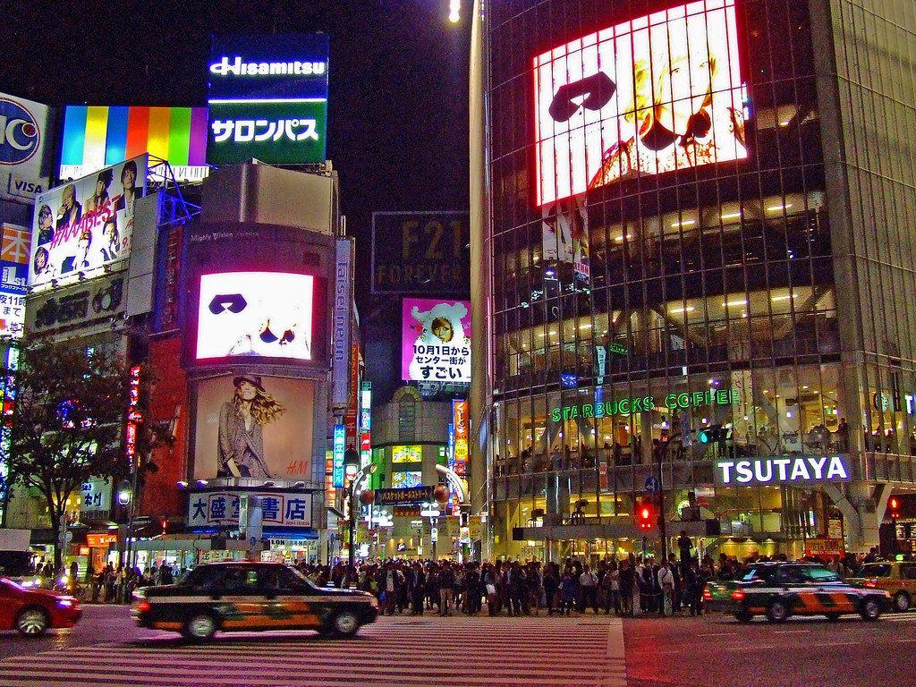 1024x768 Shibuya Crossing at Night. The building on the right is whe
