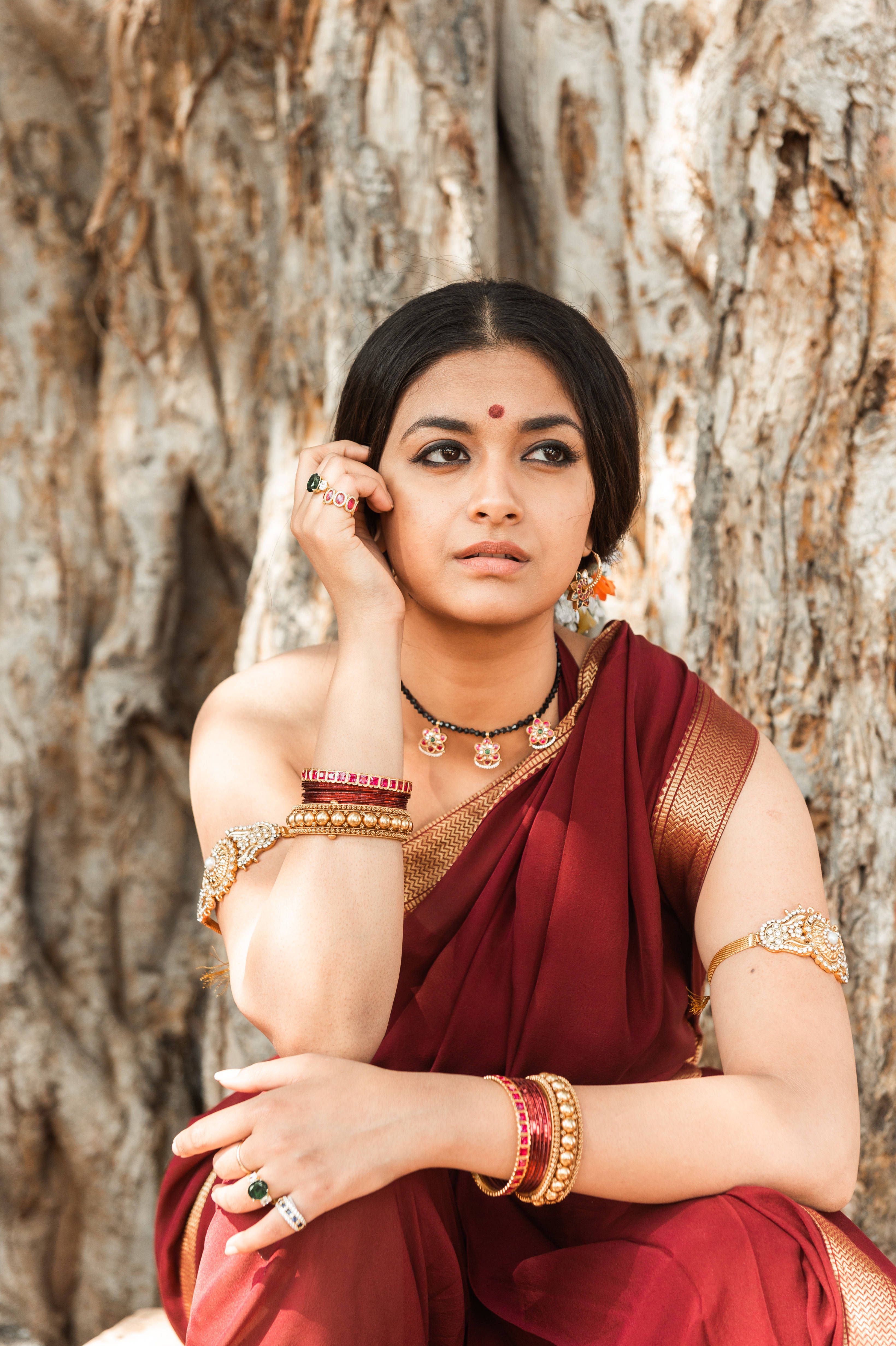 3280x4928 Download Elegant Keerthi Suresh in Vibrant Red Saree Wallpaper