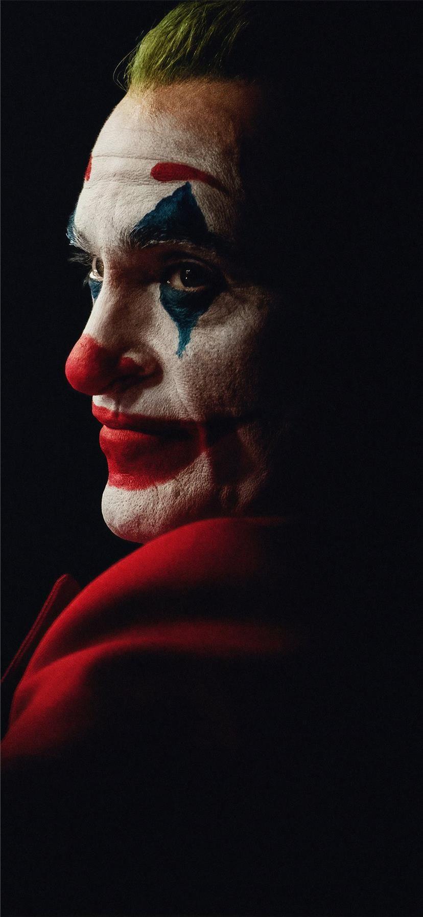 828x1792 the joker joaquin phoenix dark 4k iPhone X Wallpaper Free Download