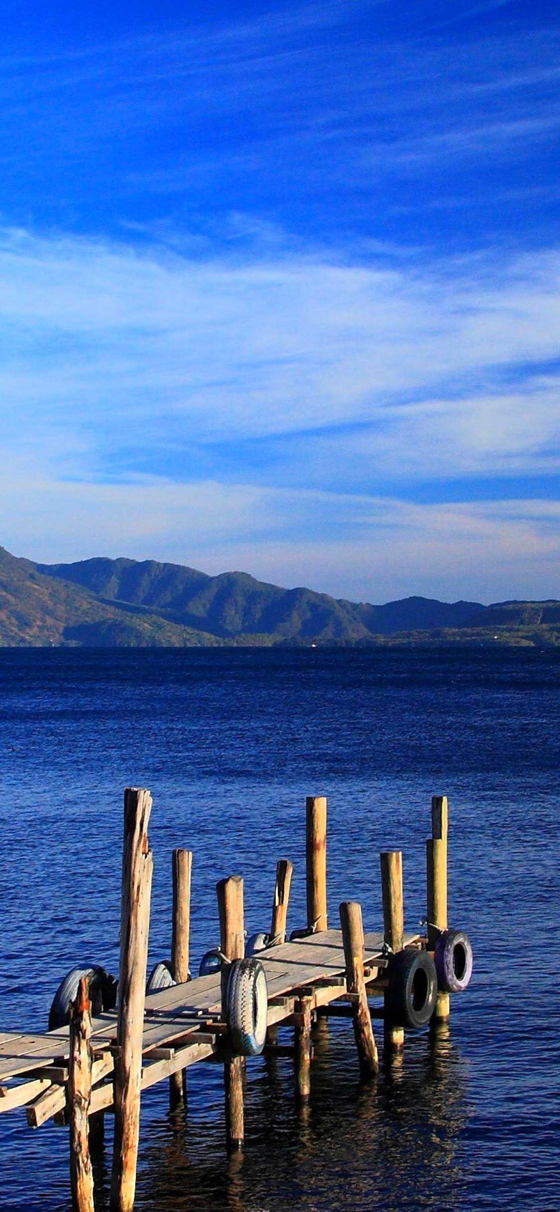 1125x2436 iPhone Pro Wallpaper Guatemala island mountain HD. Sunset iphone wallpaper, Guatemala travel, iPhone pro