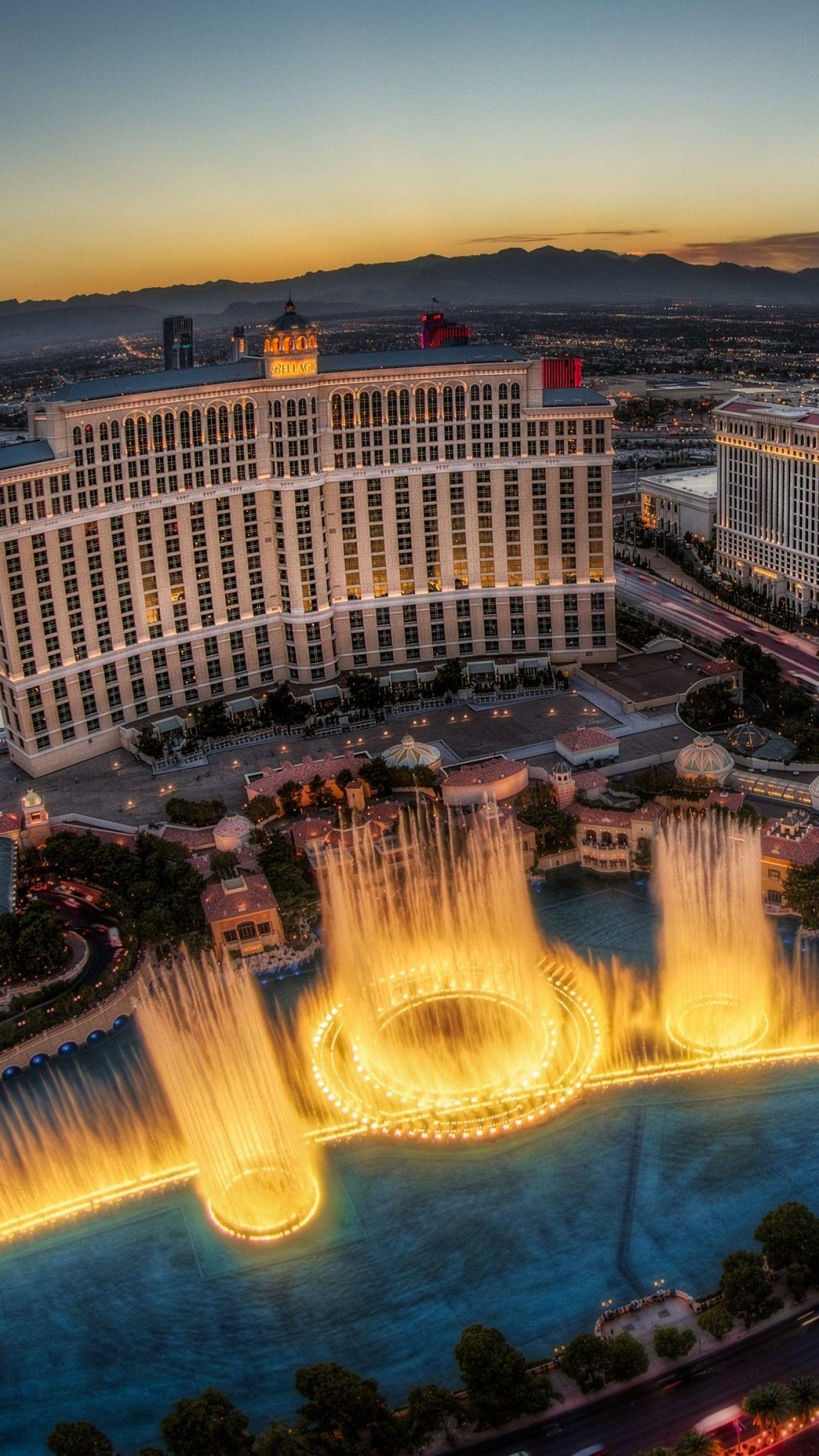1440x2560 Wallpaper Las Vegas, Usa, Nevada, Bellagio, fountain, travel, vacation, sunset, lights, night, booking, casino, Travel