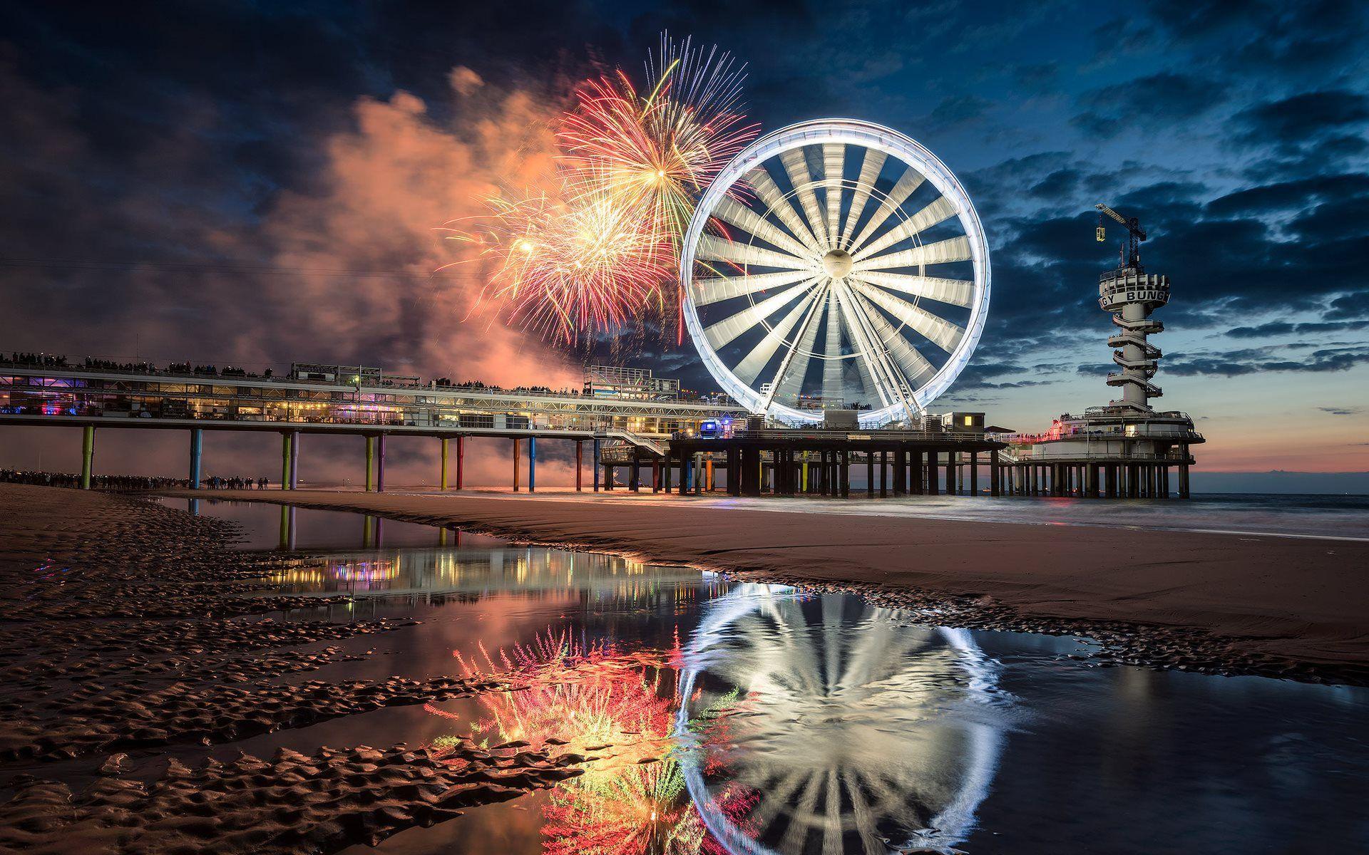 1920x1200 Download wallpaper Scheveningen, beach, night, Ferris wheel, fireworks, holiday, embankment, Netherlands, North sea for desktop with resolution 1920x1200. High Quality HD picture wallpaper