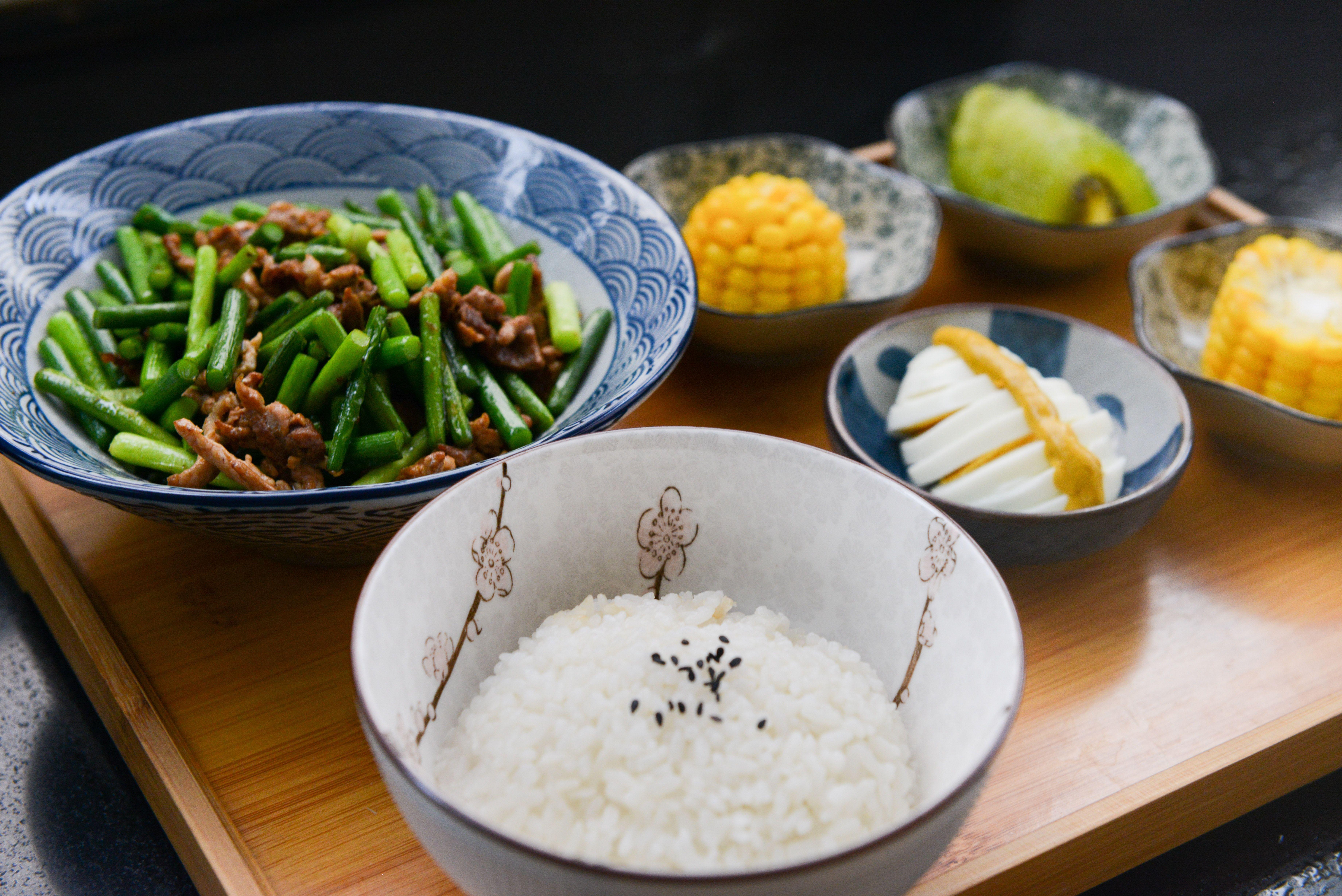 7360x4912 Rice On Bowl, Sliced Egg, Corn, And Vegetable On Table · Free
