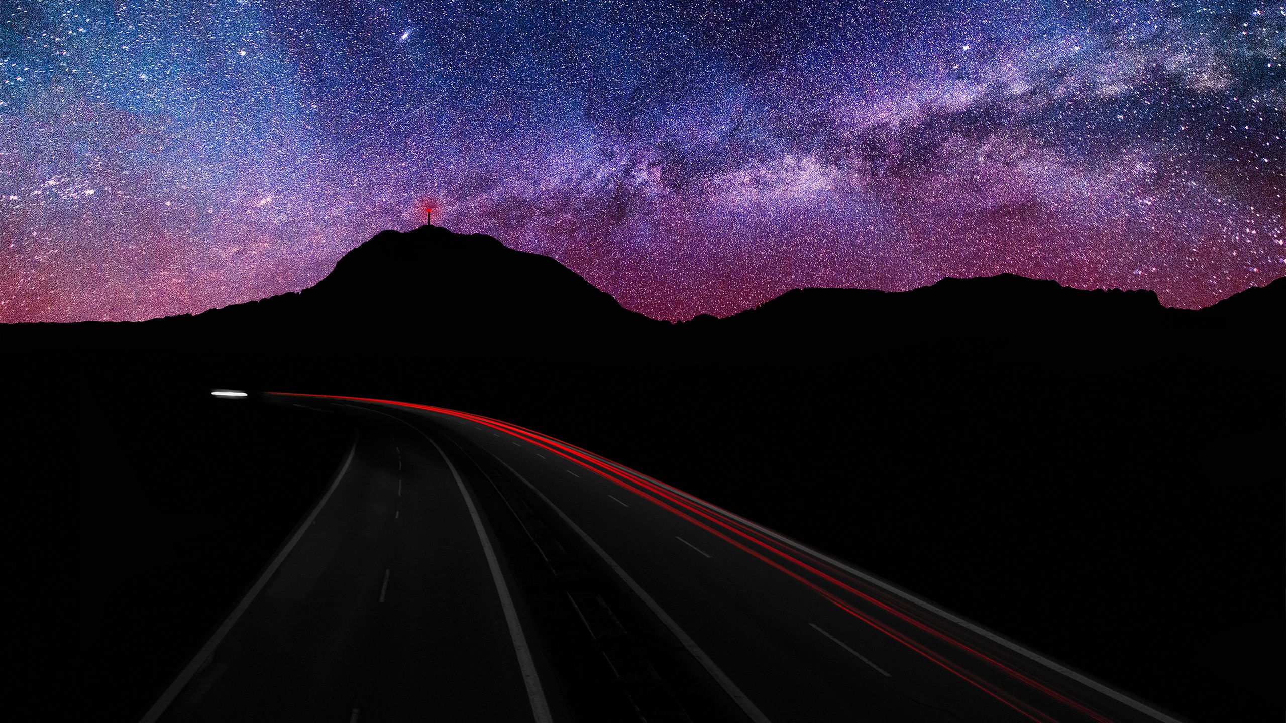 2560x1440 Highways Near Mountain Under Purple And Blue Sky With Stars HD Space Wallpaper