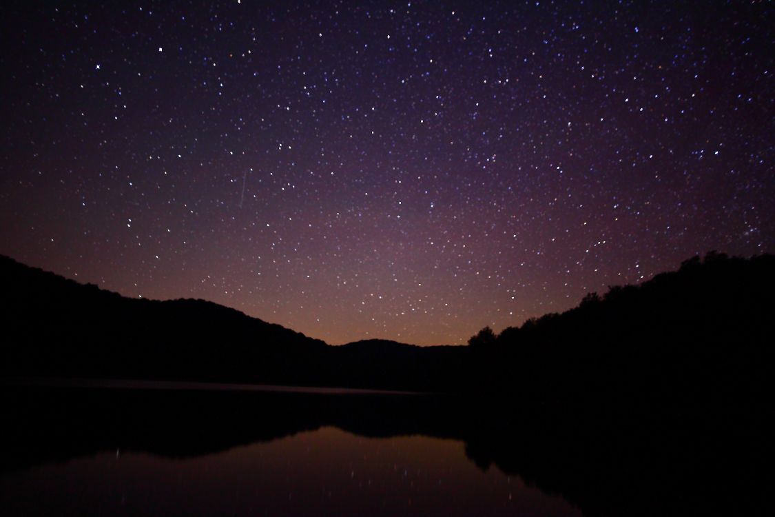 1125x750 Wallpaper Silhouette of Mountain Near Body of Water During Night Time, Background Free Image