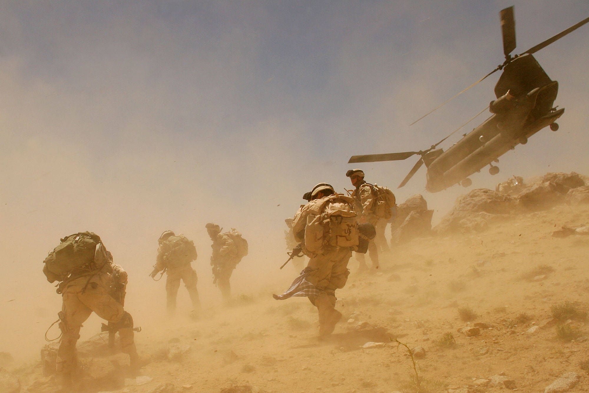 2000x1334 Download Caption: Afghanistan Military Forces in a Desert Storm Wallpaper