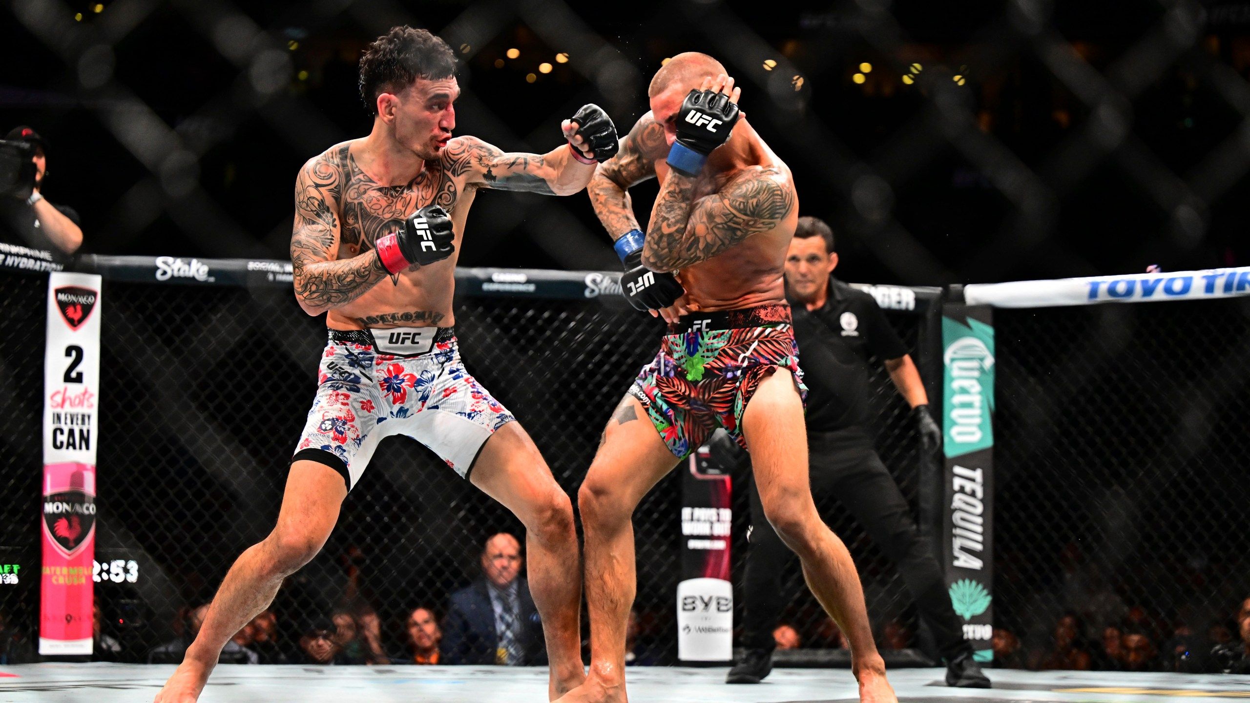 2560x1440 Max Holloway retains UFC BMF title, spoils Dustin Poirier's retirement fight