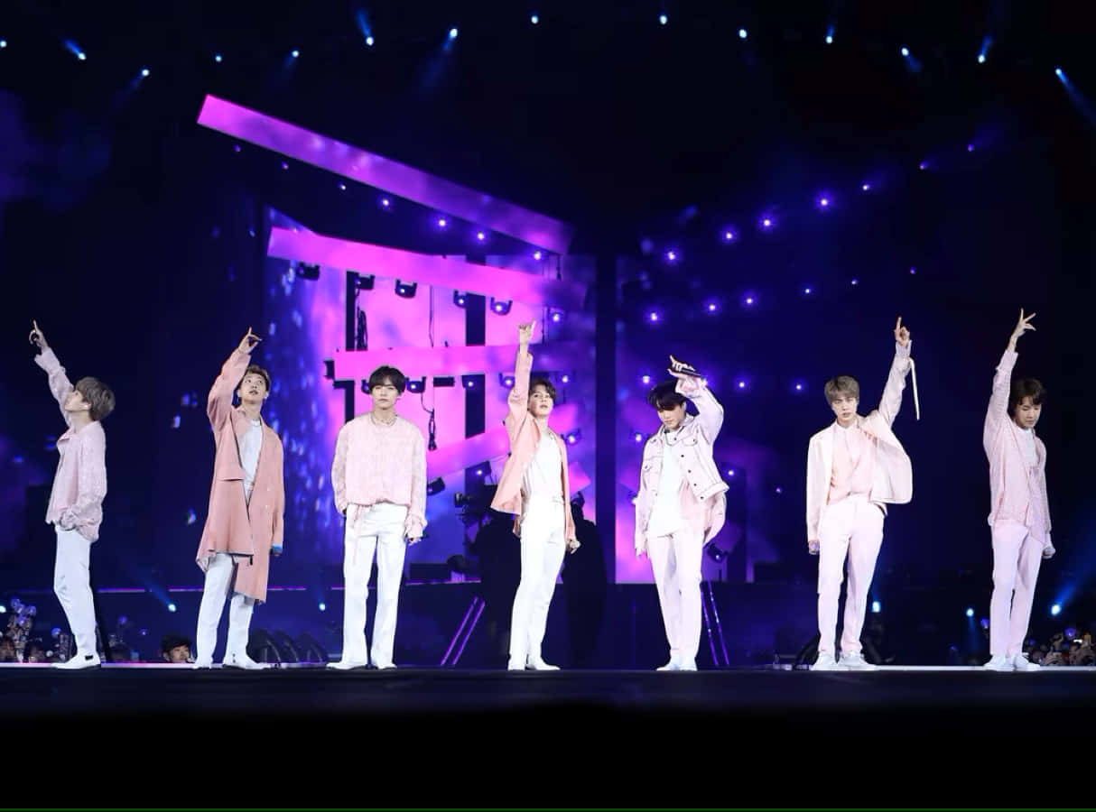 1214x900 Download Captivating moment of BTS performing on stage Wallpaper