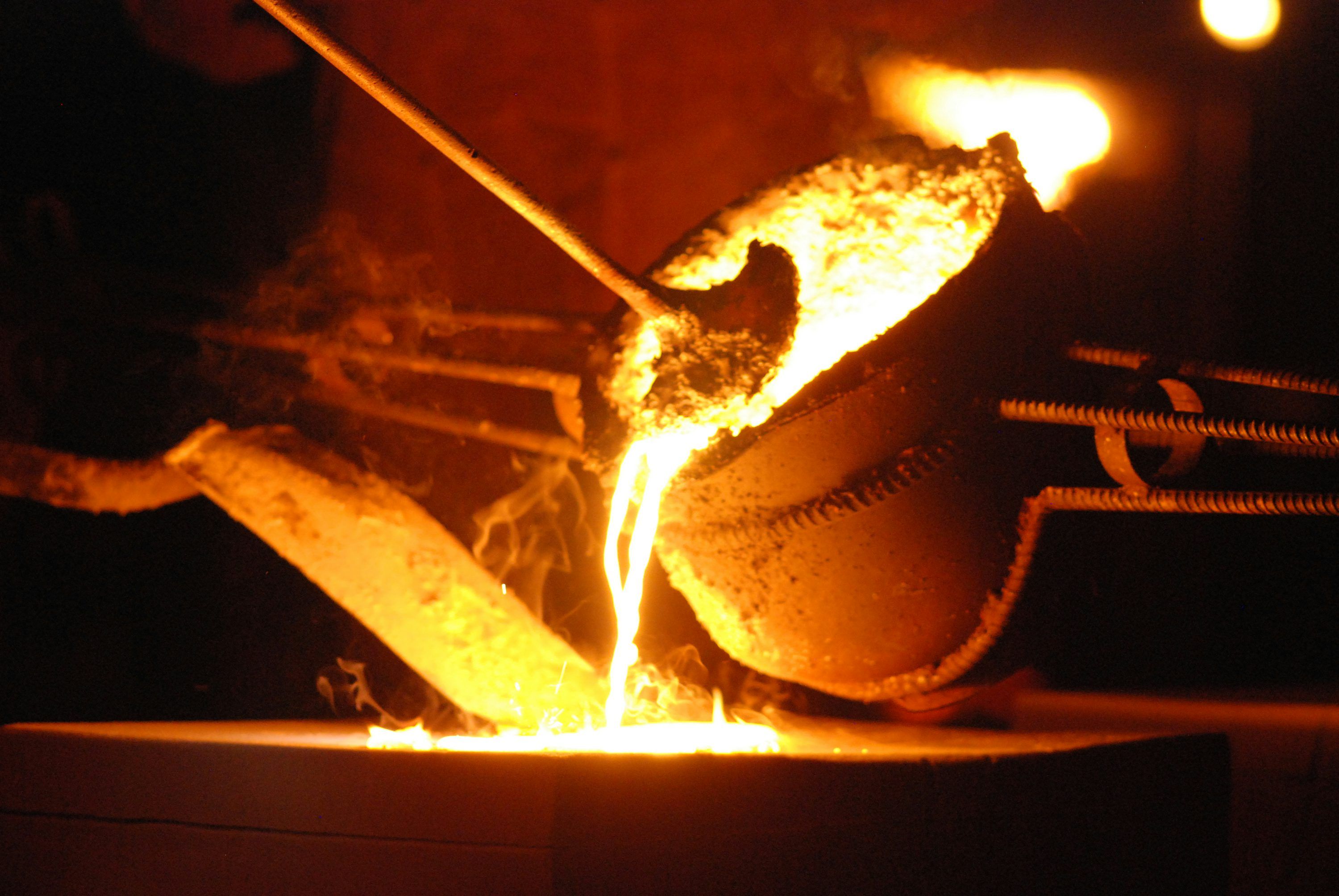 3000x2008 A baseball being made on a fire pit