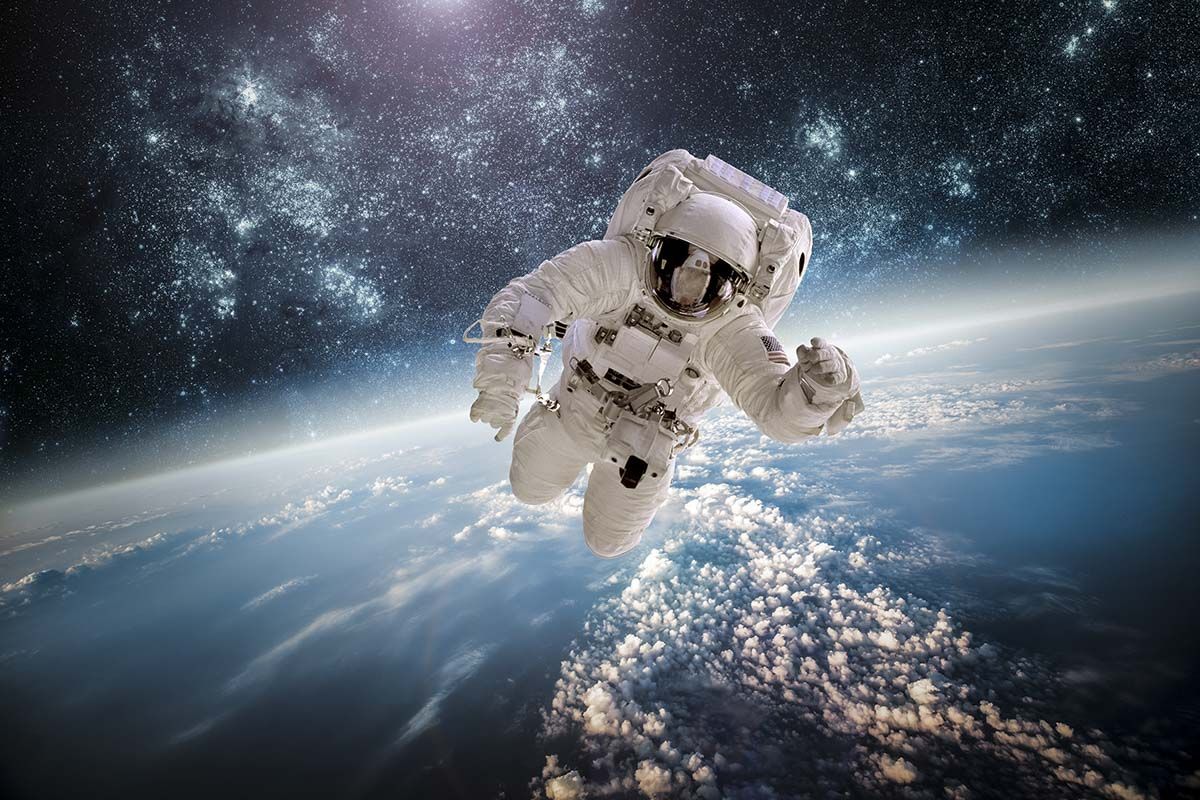 1200x800 3D Astronaut Above Earth Cosmic Style Wallpaper®