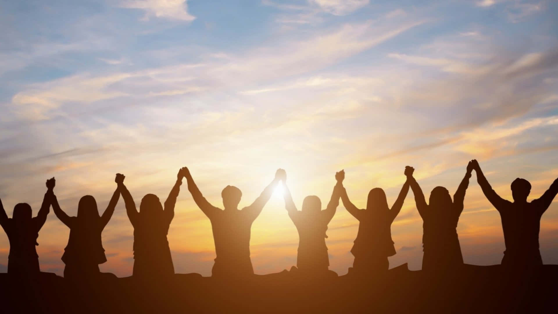1920x1080 Download silhouette of people raising their hands at sunset Picture