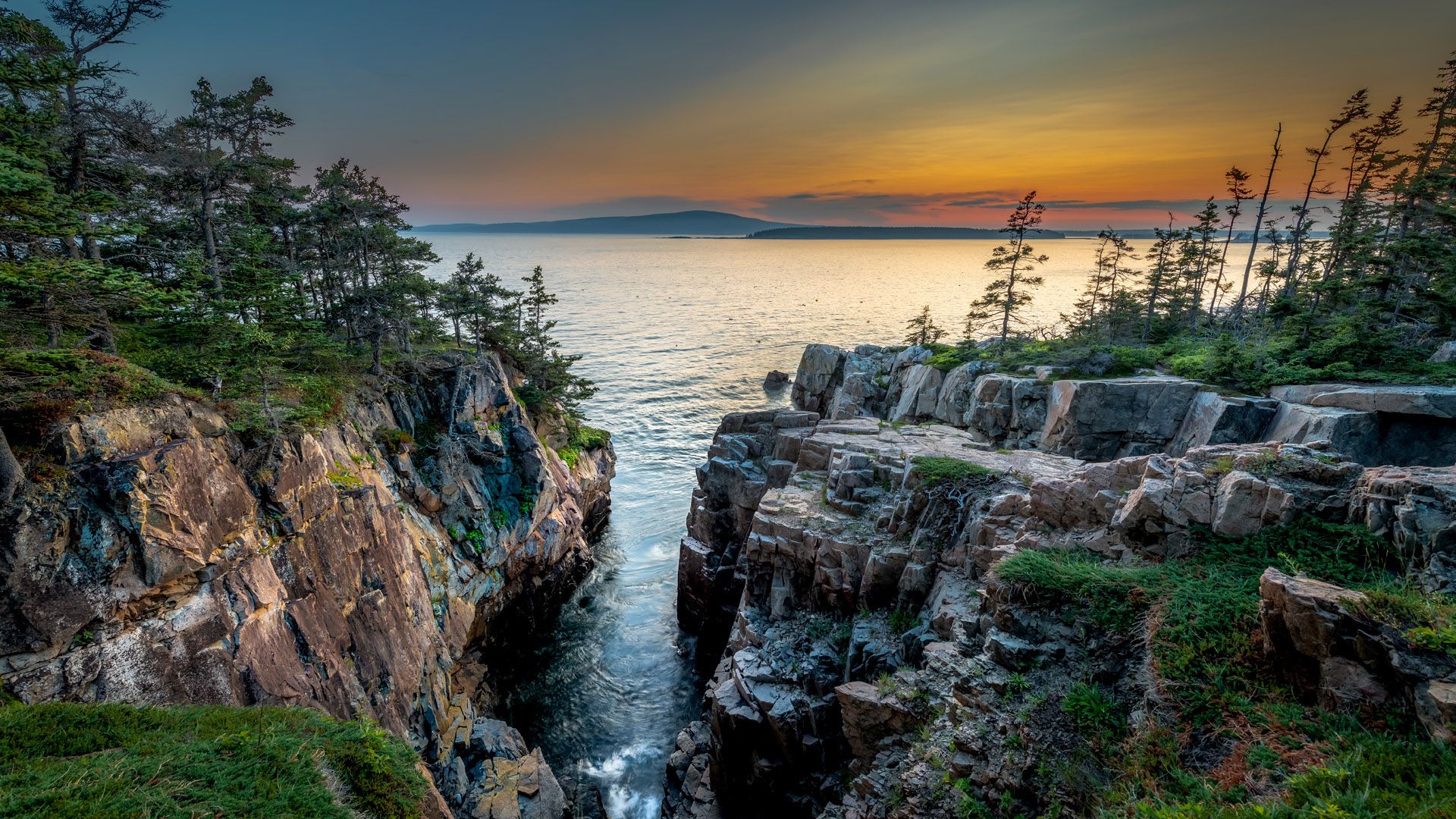 1920x1080 Sunset at Ravens Nest looking towards Acadia National Park and Cadillac Mountain, Maine, USA. Windows Spotlight Image