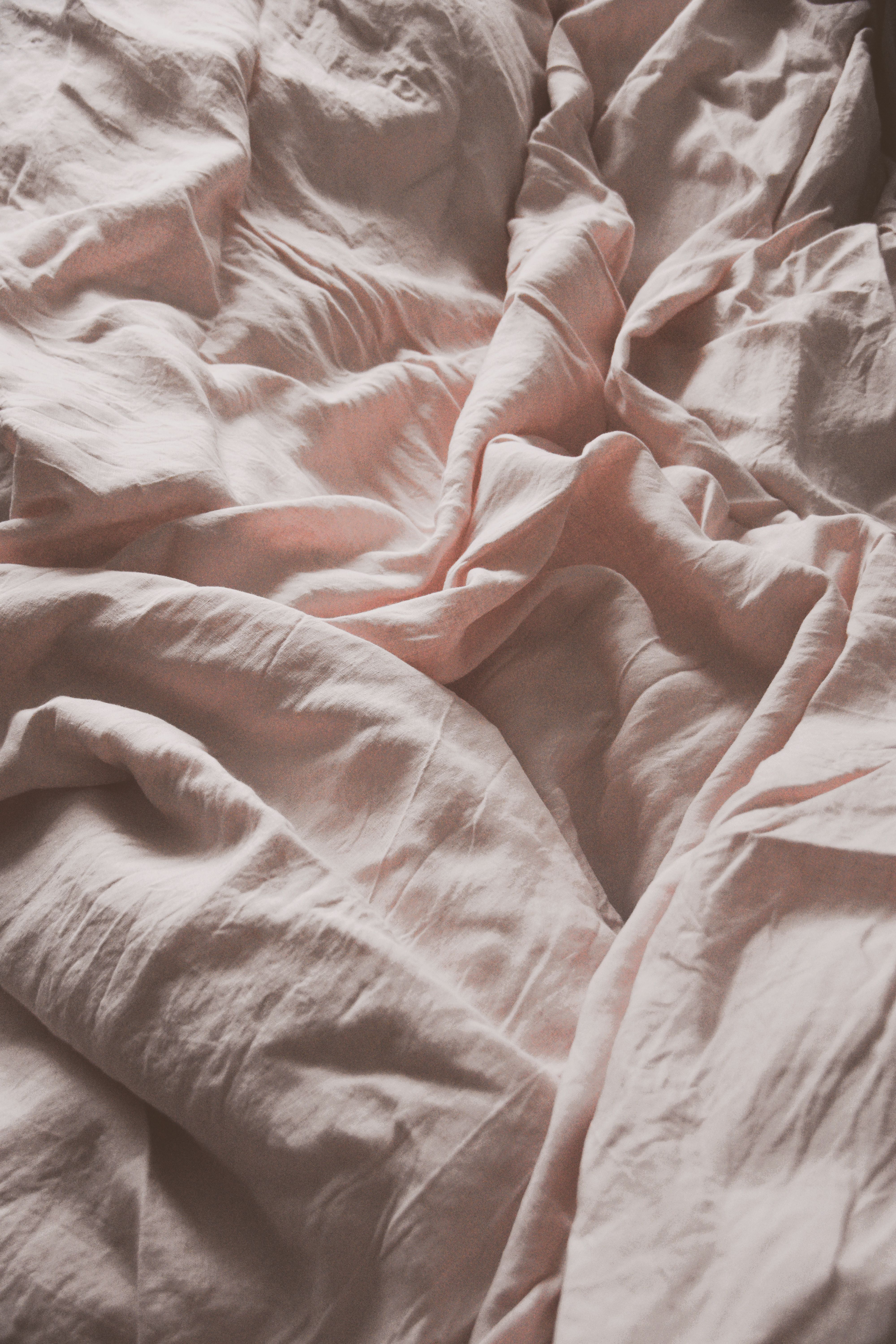 4000x6000 Close Up Of Crinkled Pink Bed Sheets · Free