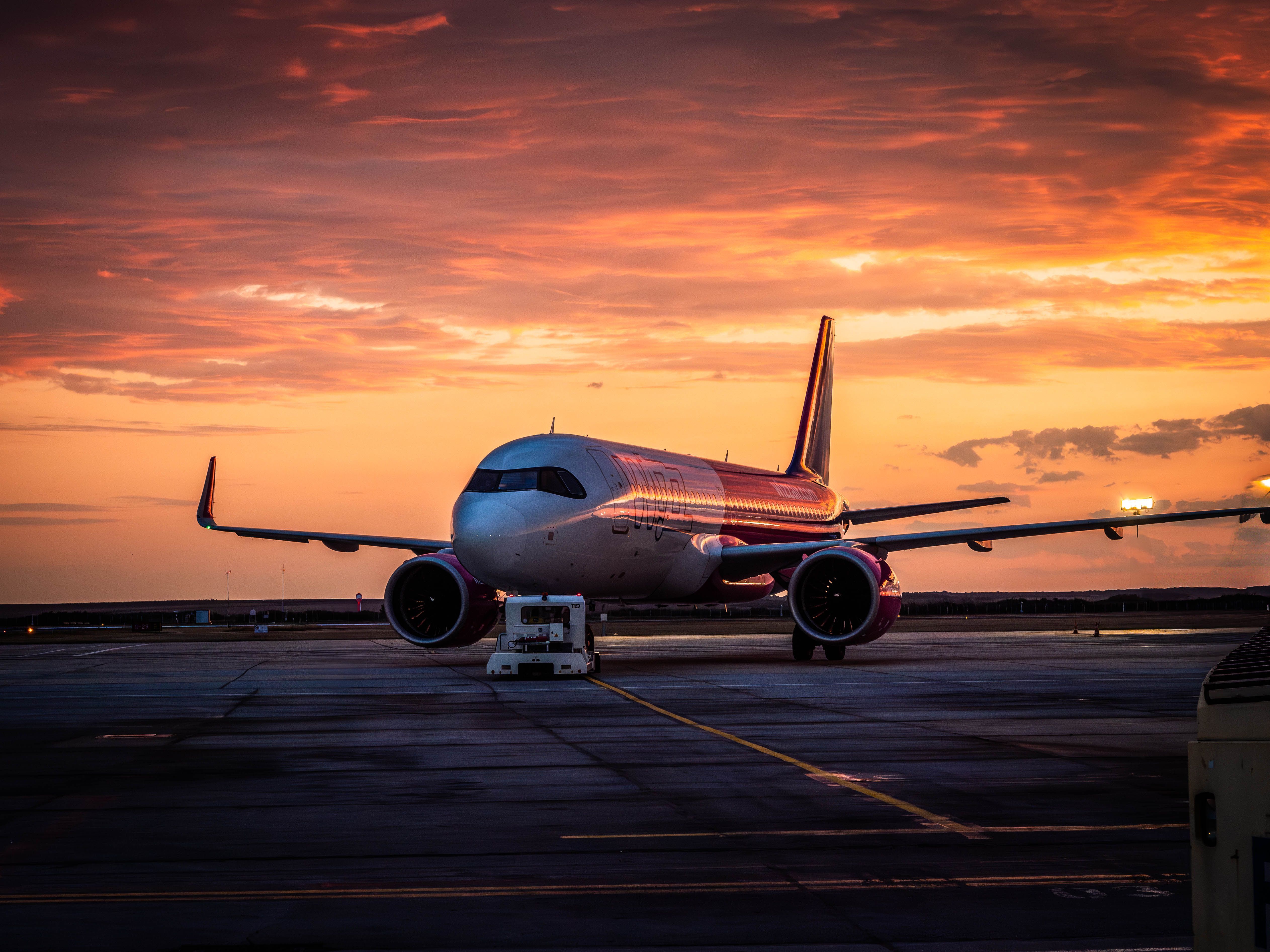 5051x3788 Airplane at Timișoara Airport during Sunrise · Free