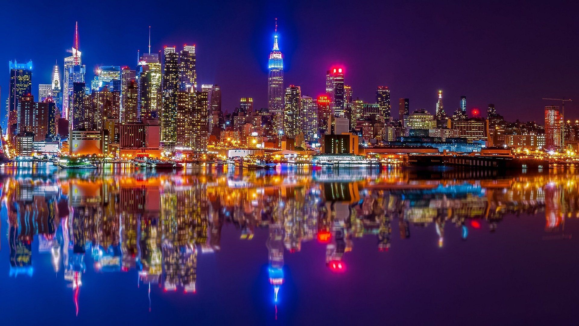 1920x1080 Manhattan Nights: Stunning Hudson River Cityscape Reflection