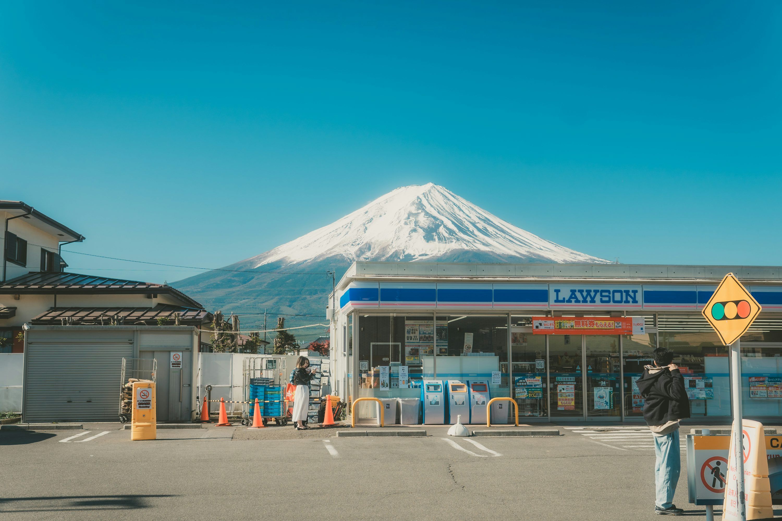 3000x2000 Snow Capped Mount Fuji Overlooks A Japanese Lawson Convenience Store