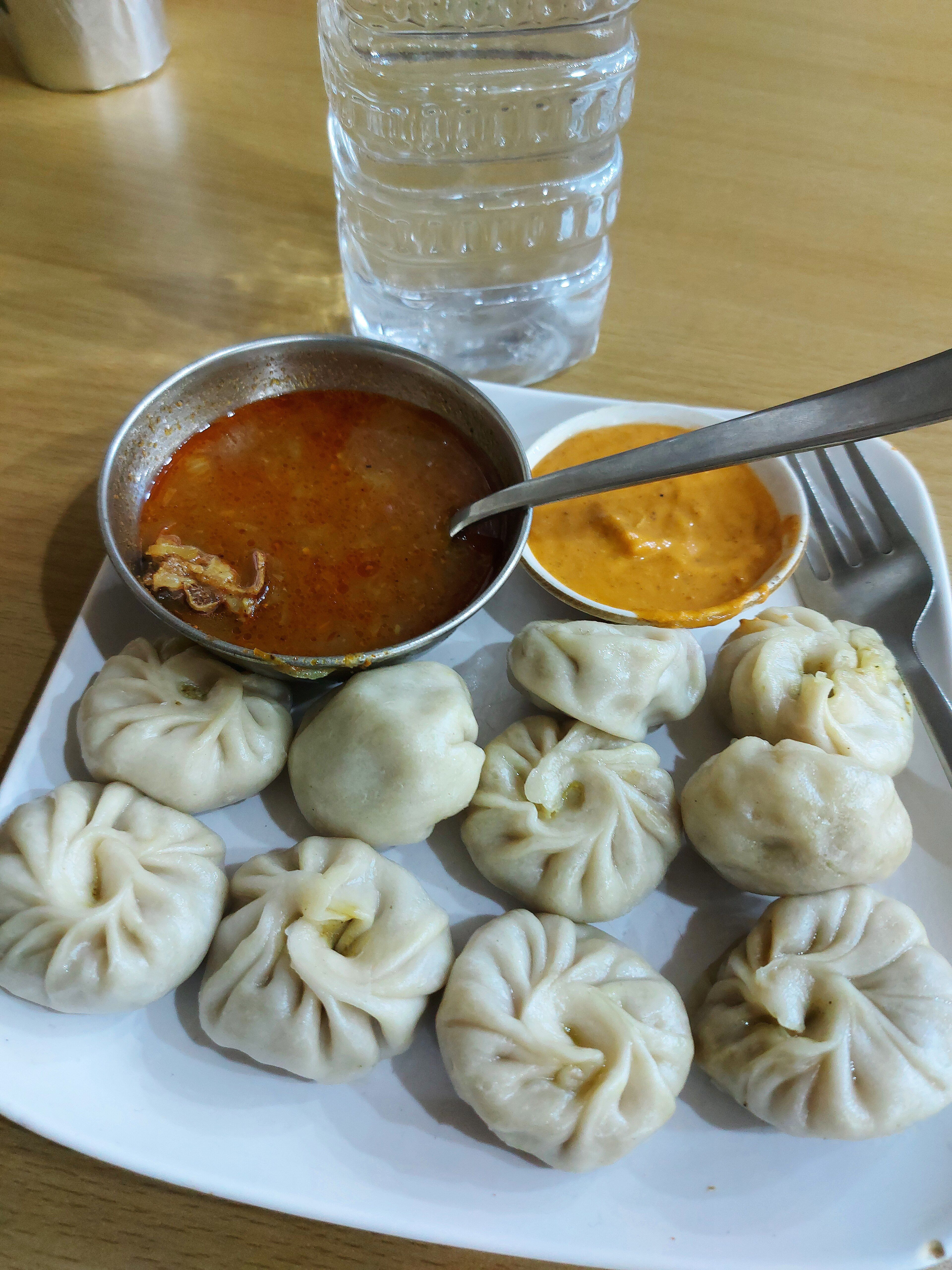 3840x5120 A plate of Chicken Momos with