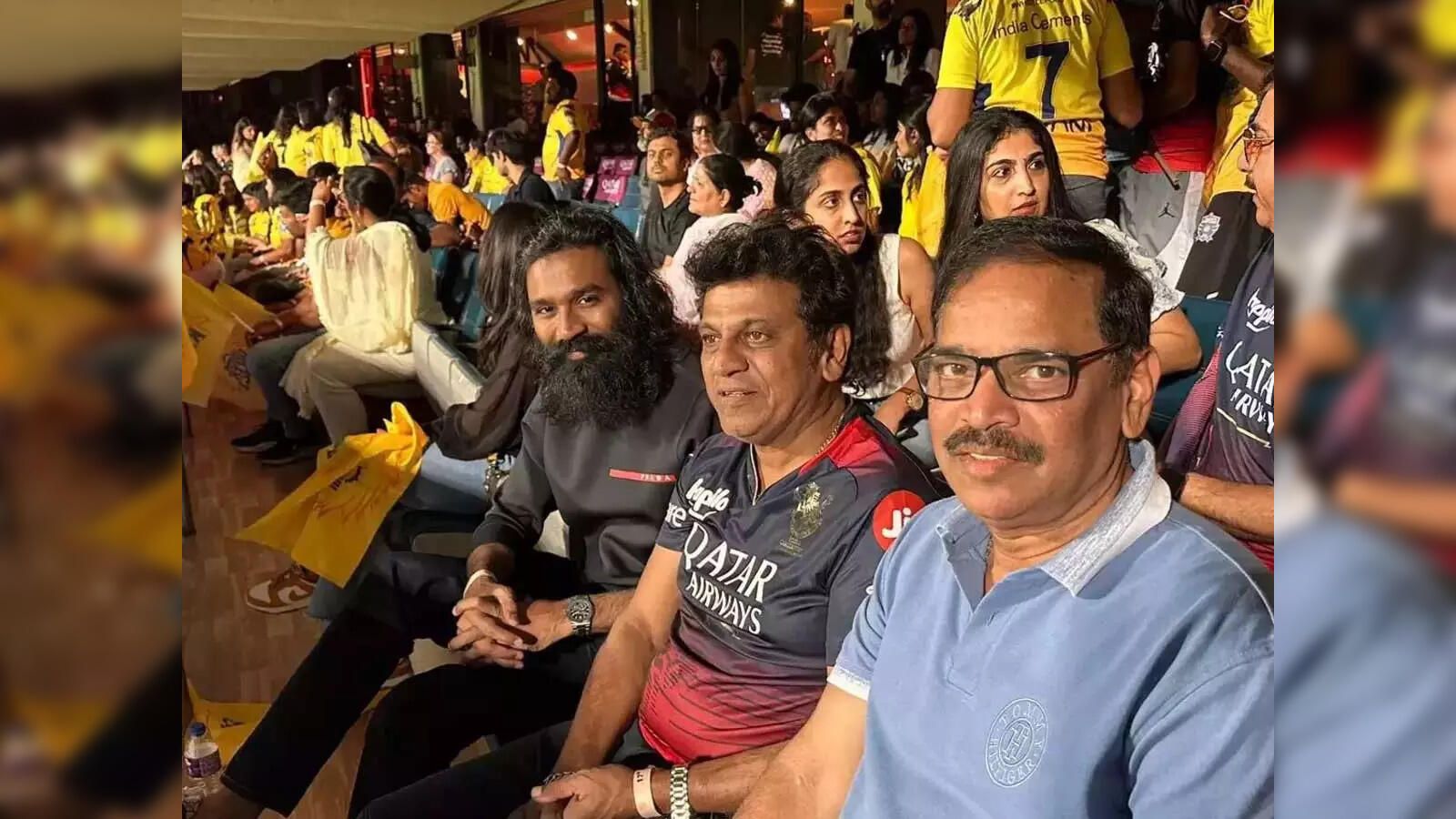 1600x900 dhanush: IPL 2023's CSK vs RCB match: Actors Dhanush and Shiva Rajkumar spotted watching game Economic Times
