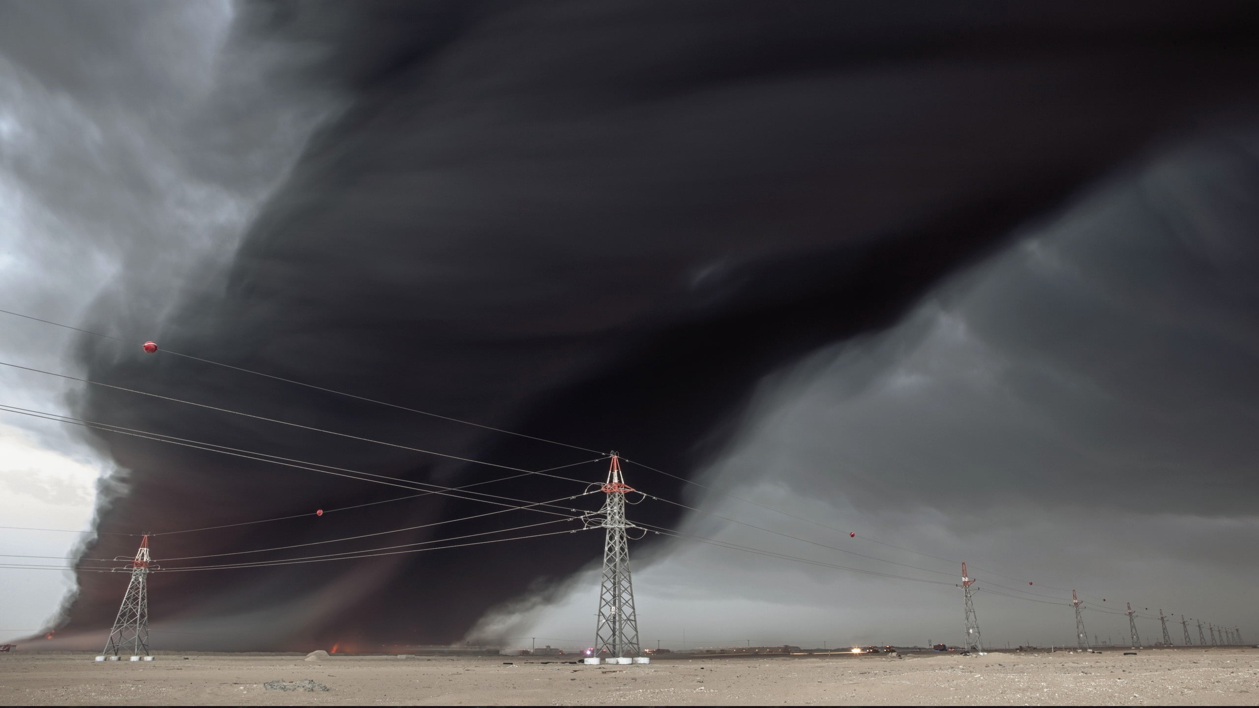 2560x1440 Gray metal electricity pylon, desert, wire, tornado, fire HD wallpaper