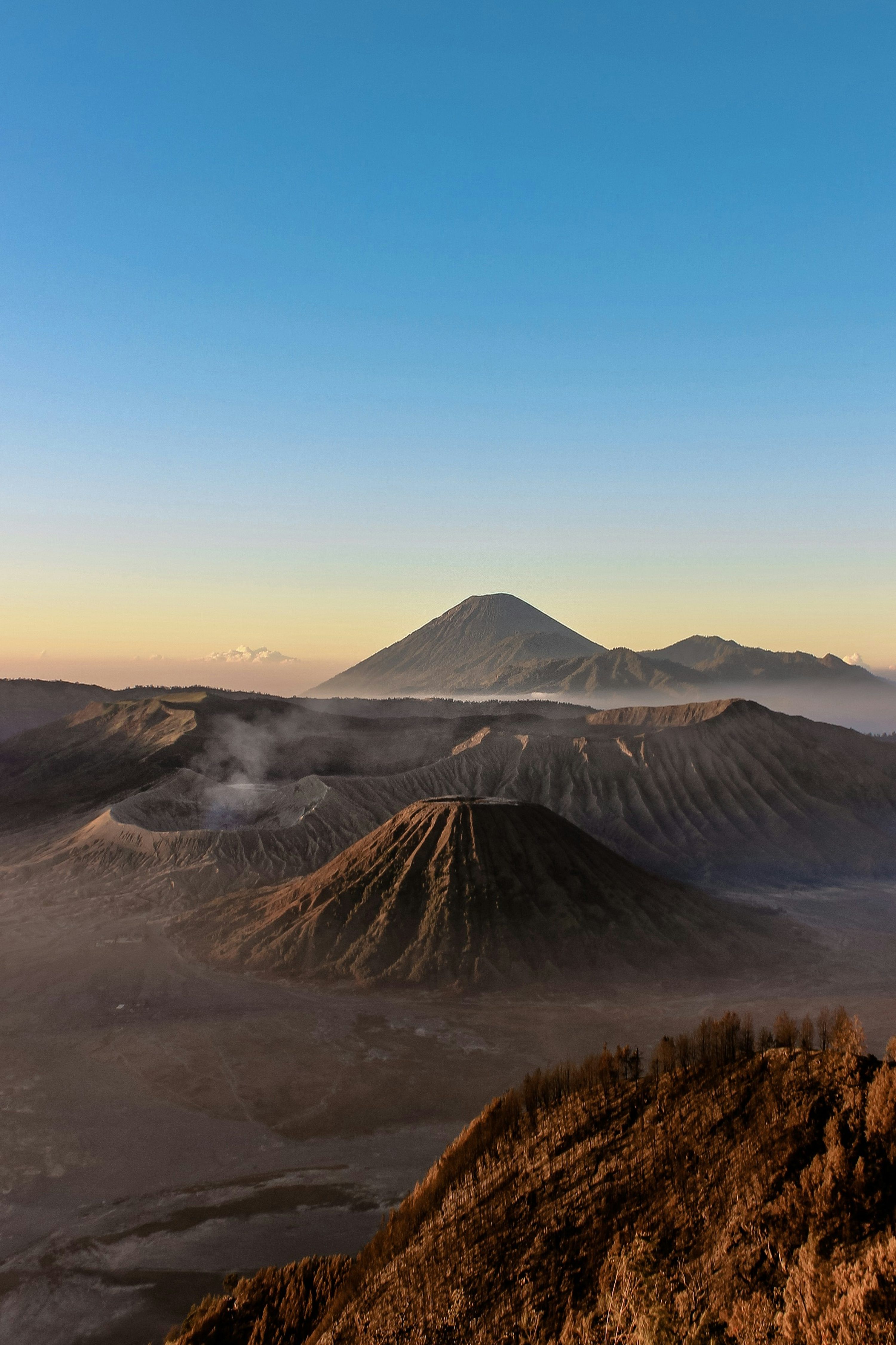 3000x4500 Brown mountain under blue sky during daytime