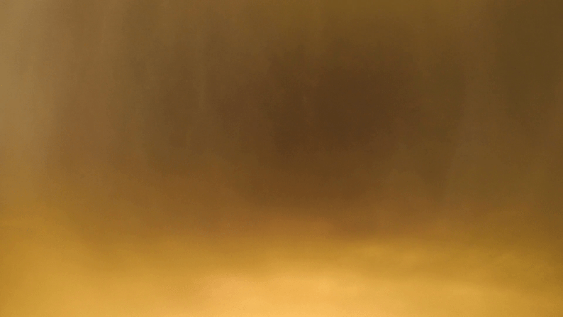 1920x1080 Golden abstract blur of the background. Yellow background out of focus in motion. Play and movement of the of light