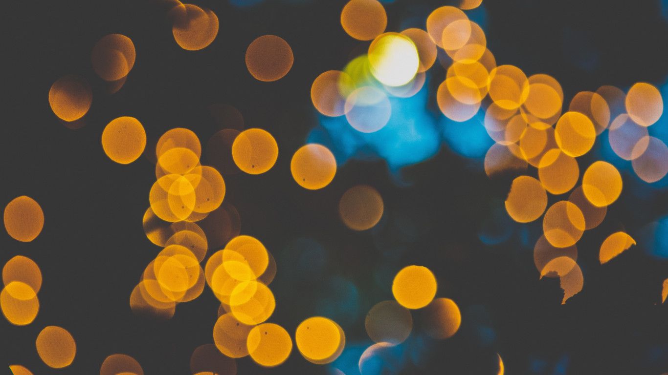 1366x768 4K Yellow Bokeh Background Widescreen Wallpaper 41026