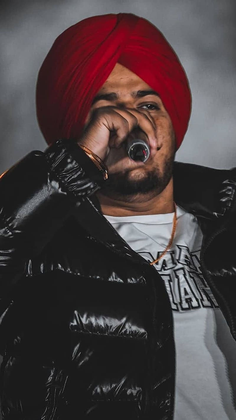 800x1422 1280x720px, 720P free download. Sidhu Moose Wala, Holding Mic, rapper, music, HD phone wallpaper