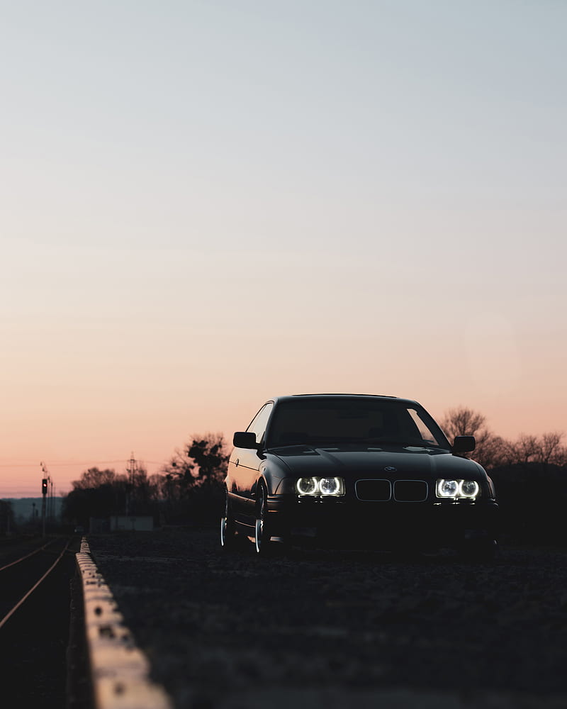 800x1000 Bmw, car, black, headlights, light, twilight, HD phone wallpaper