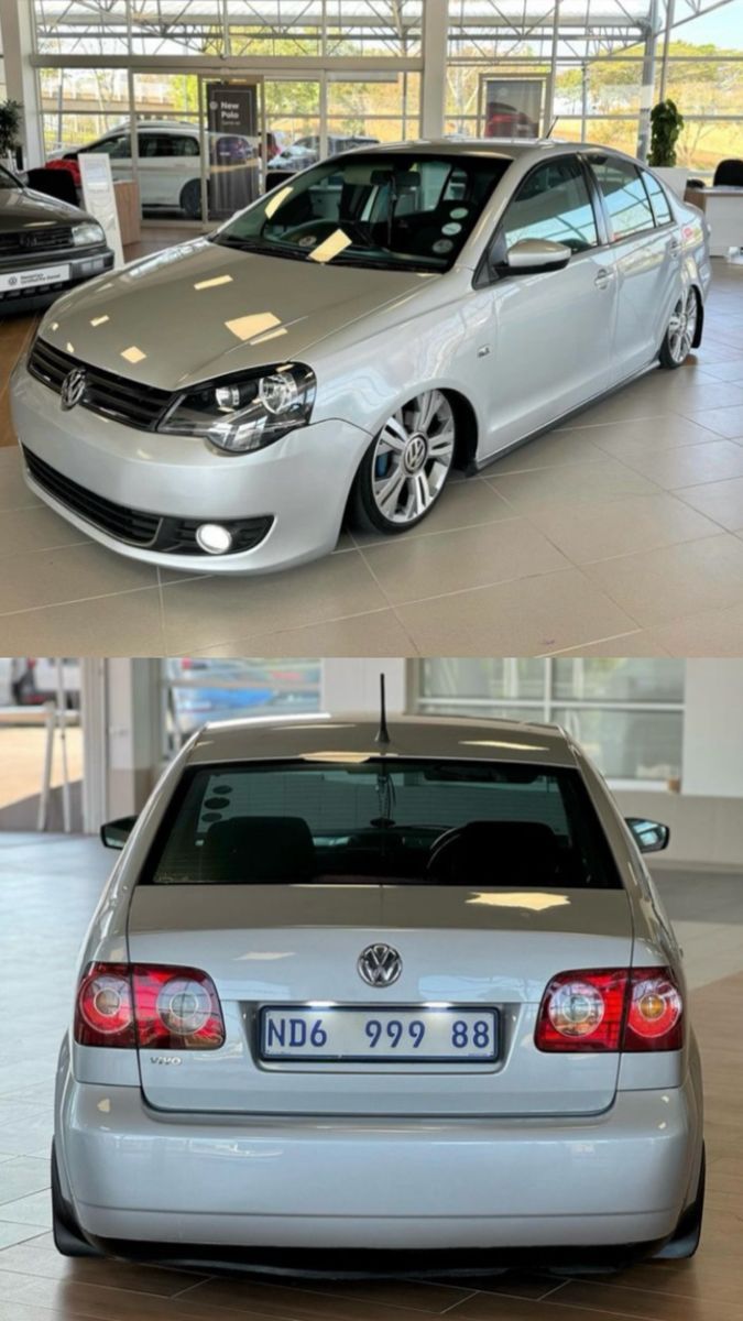 675x1200 This VW Polo Vivo Sedan 1.6 Comfortline is slammed to perfection, sitting low on 16 original VW UP rims. A clean, sleek stance build that commands attention on the showroom floor. #SlammedVivo #