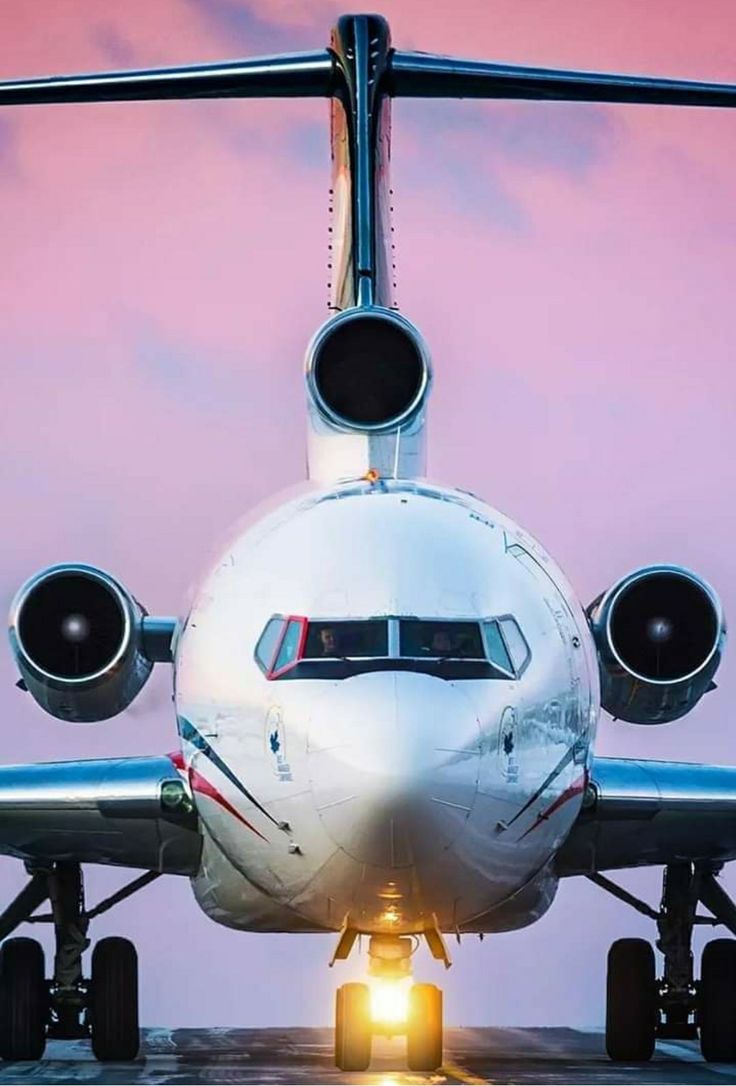 736x1086 Sunset Landing: Commercial Aircraft at Airport. Modern aircraft photography, Boeing wallpaper, Commercial airplane photography