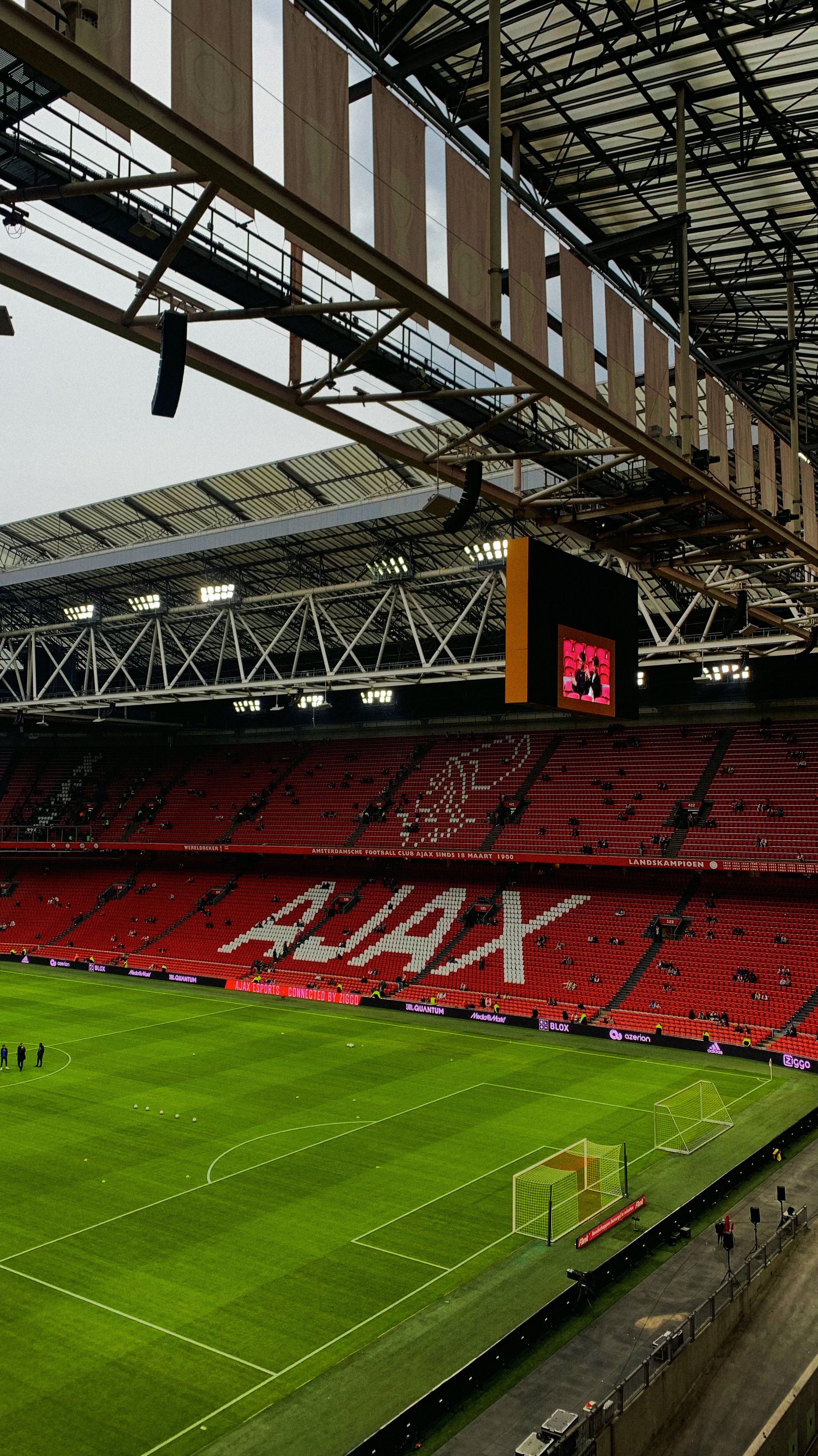 2268x4032 Field and Seats of a Football Stadium · Free