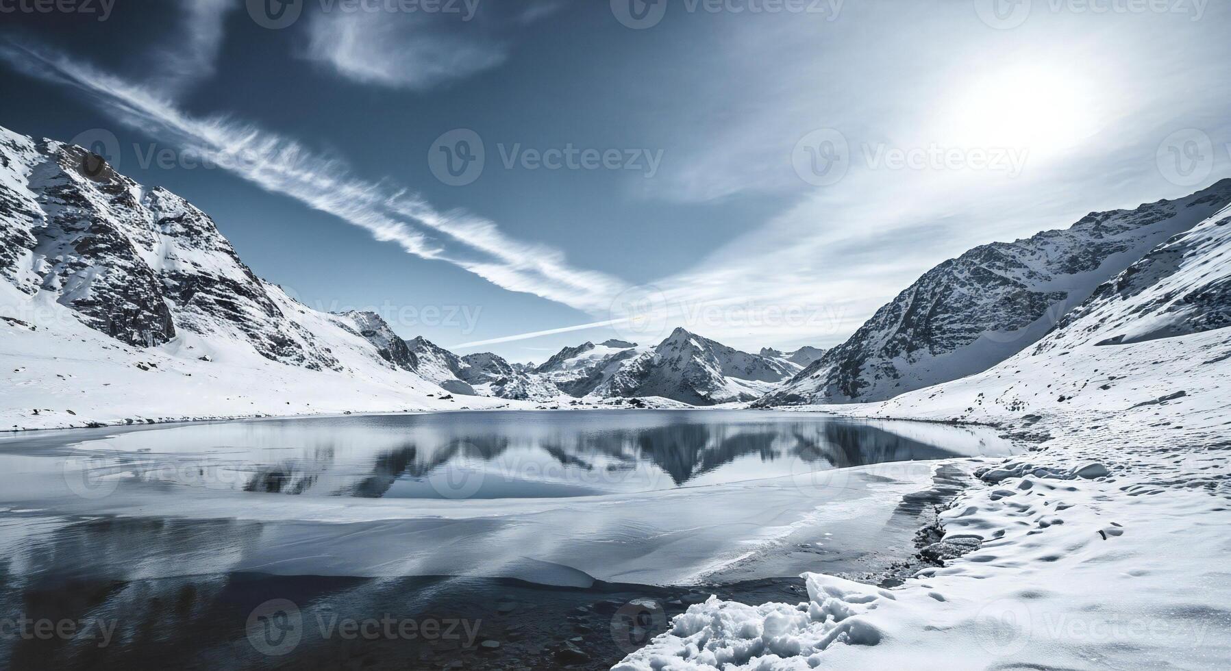 1797x980 Nature background, Nature wallpaper, Snow covered mountains surround a partially frozen lake reflecting the vast cloudy sky and distant peaks