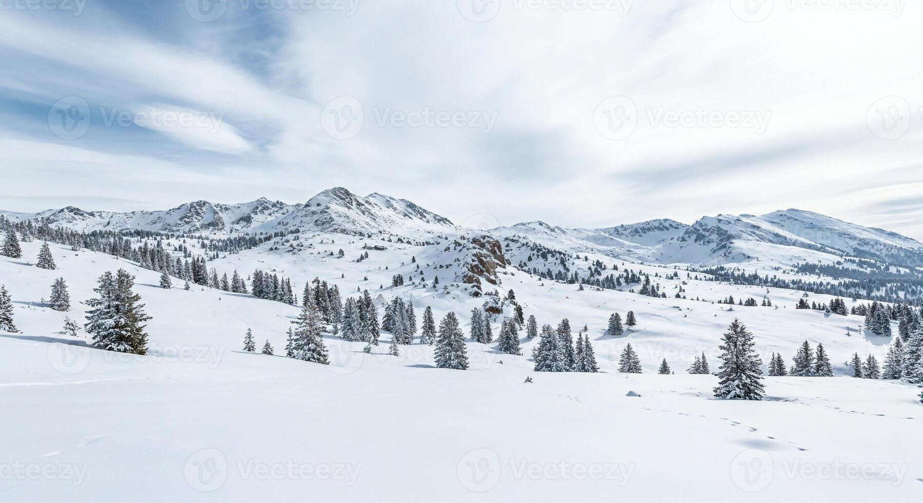 1797x980 Nature background, Nature wallpaper, Vast snow covered mountain range with scattered pine trees under a cloudy sky