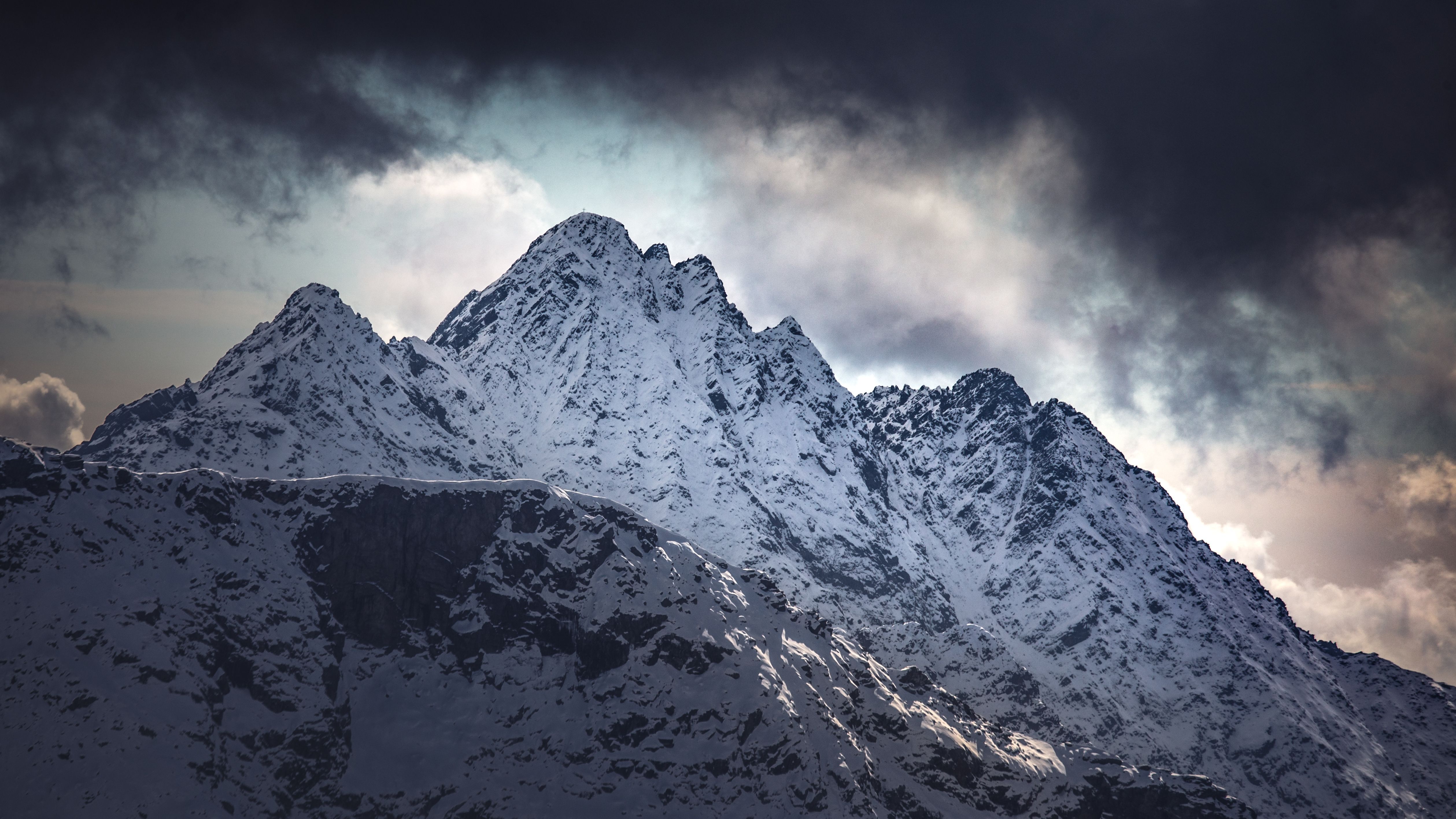 5036x2833 Snow Covered Mountain Under Cloudy Sky · Free
