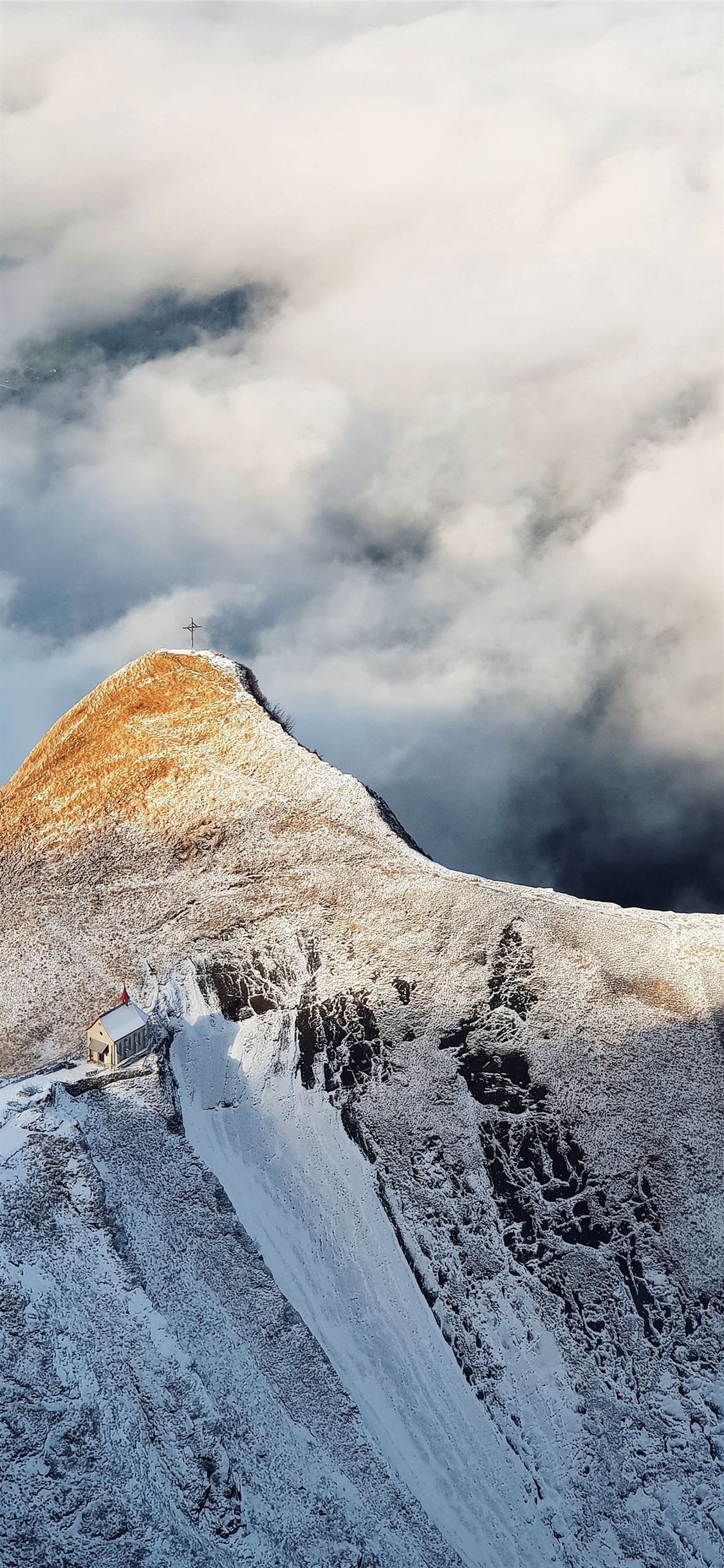 1125x2436 mountain under cloudy sky during daytime iPhone X Wallpaper Free Download
