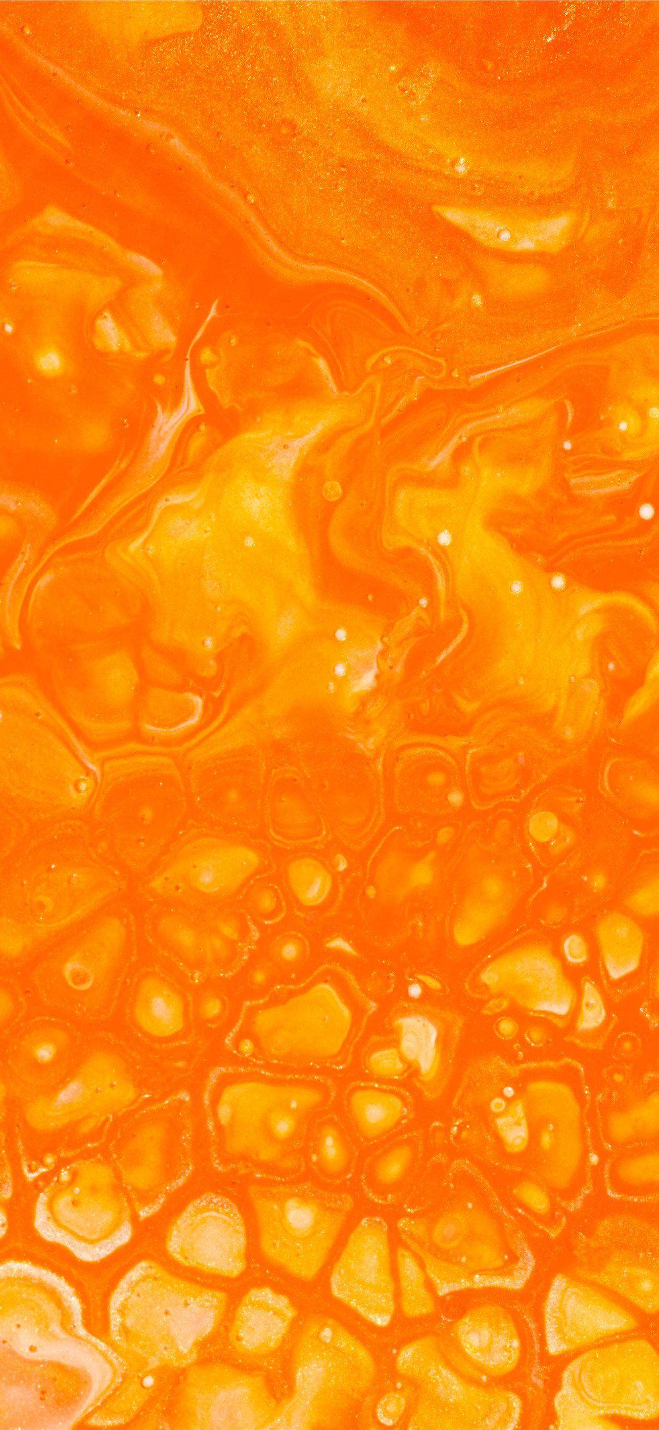 1290x2796 orange liquid in clear glass iPhone Wallpaper Free Download