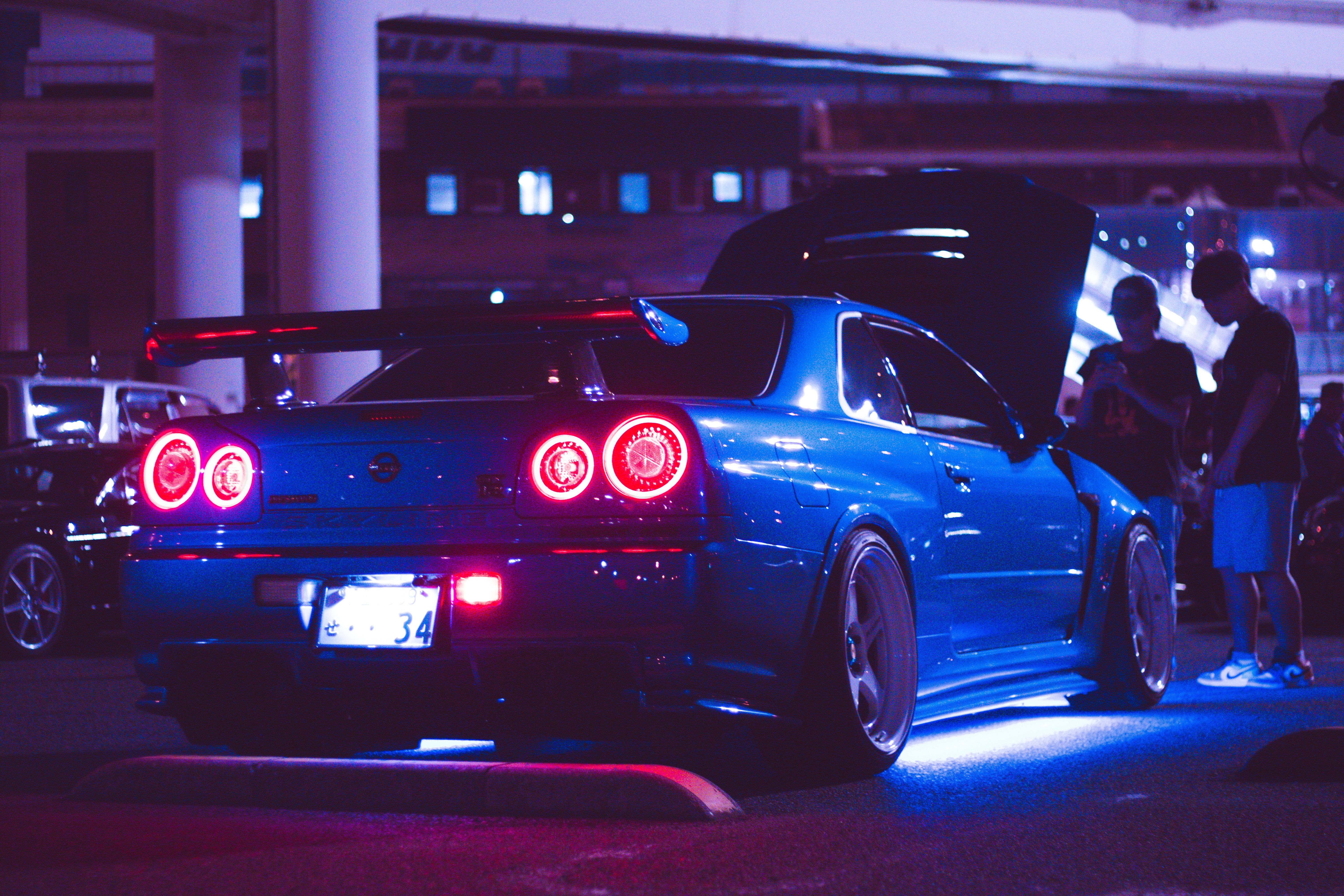 6000x4000 Blue Sports Car at Night with Neon Lights · Free