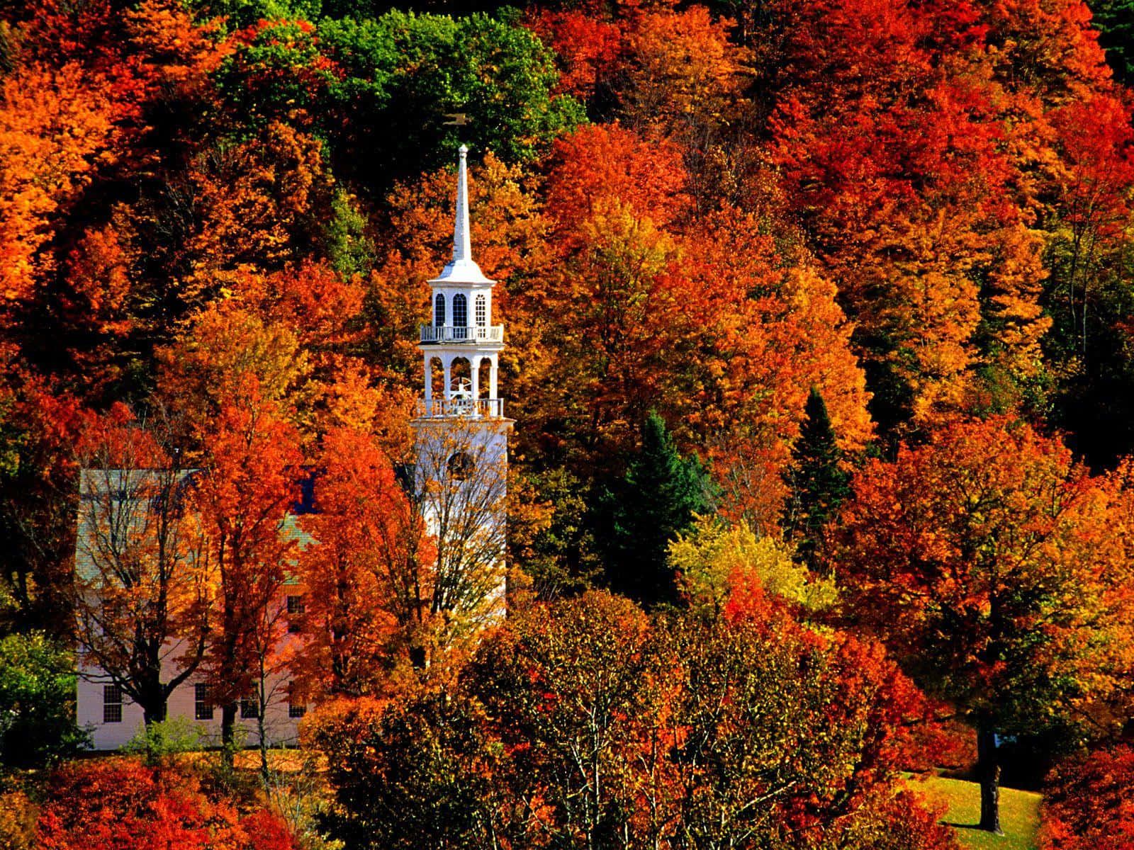 1600x1200 Download A pictureque Fall Town scene with colorful autumn leaves and charming architecture Wallpaper